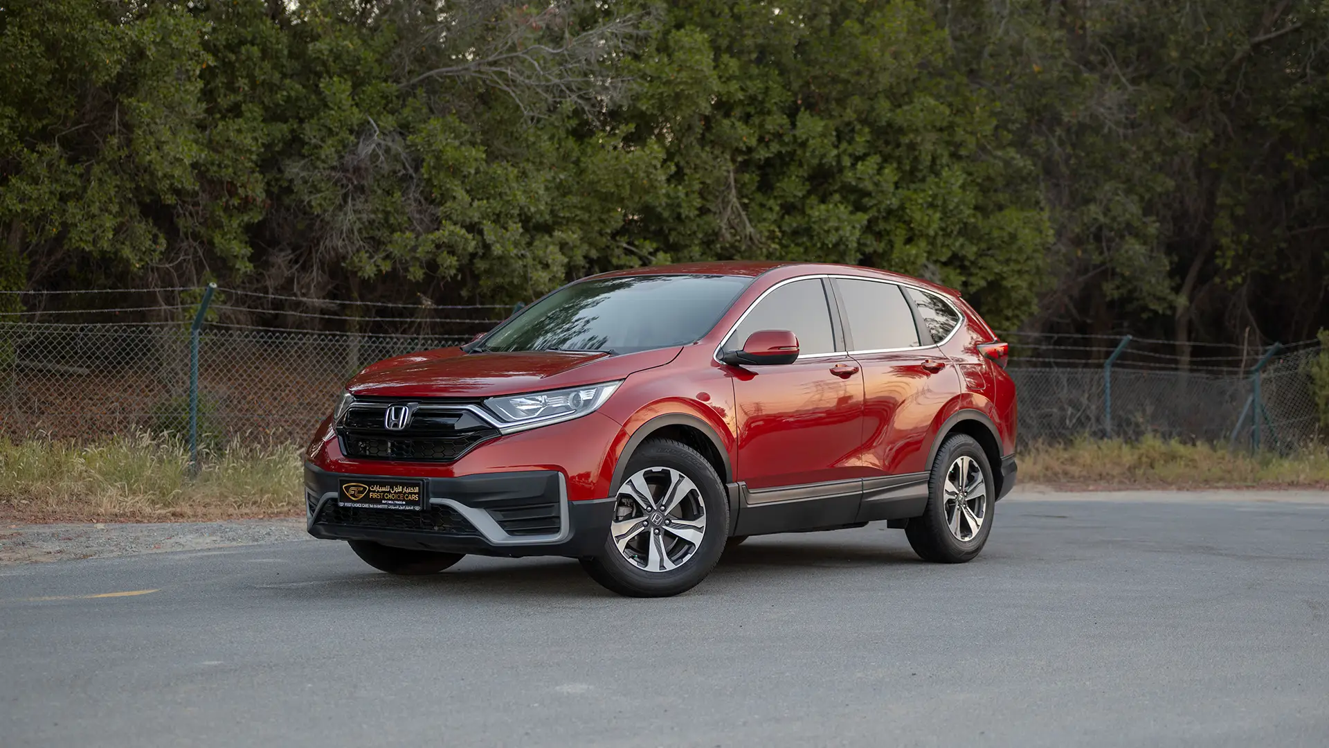 Used 2021 Honda CR-V LX in Red – Left Front Diagonal (45°) View for Sale at First Choice Cars Dubai Sharjah