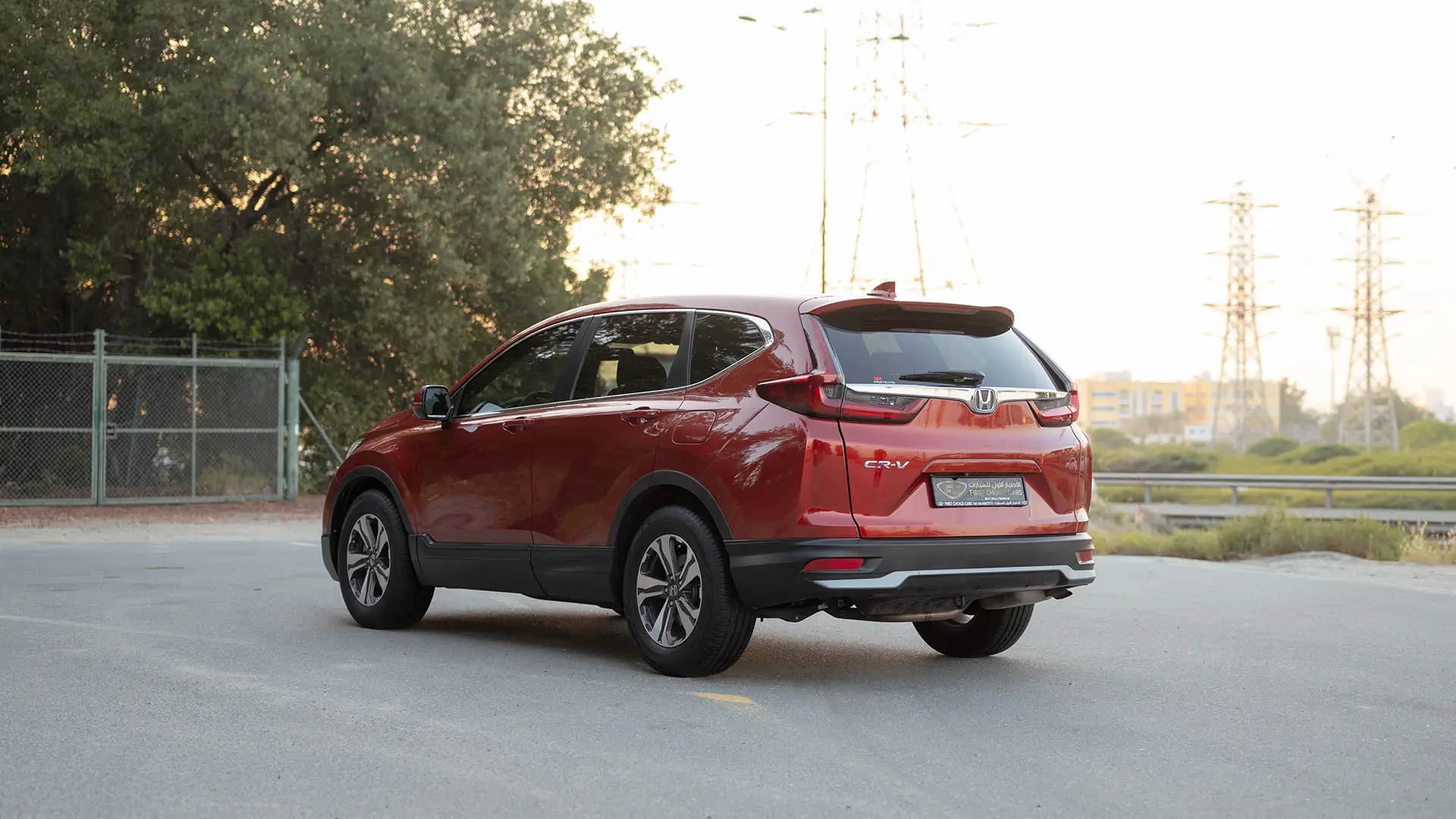 Used 2021 Honda CR-V LX in Red – Left Back Diagonal (45°) View for Sale at First Choice Cars Dubai Sharjah