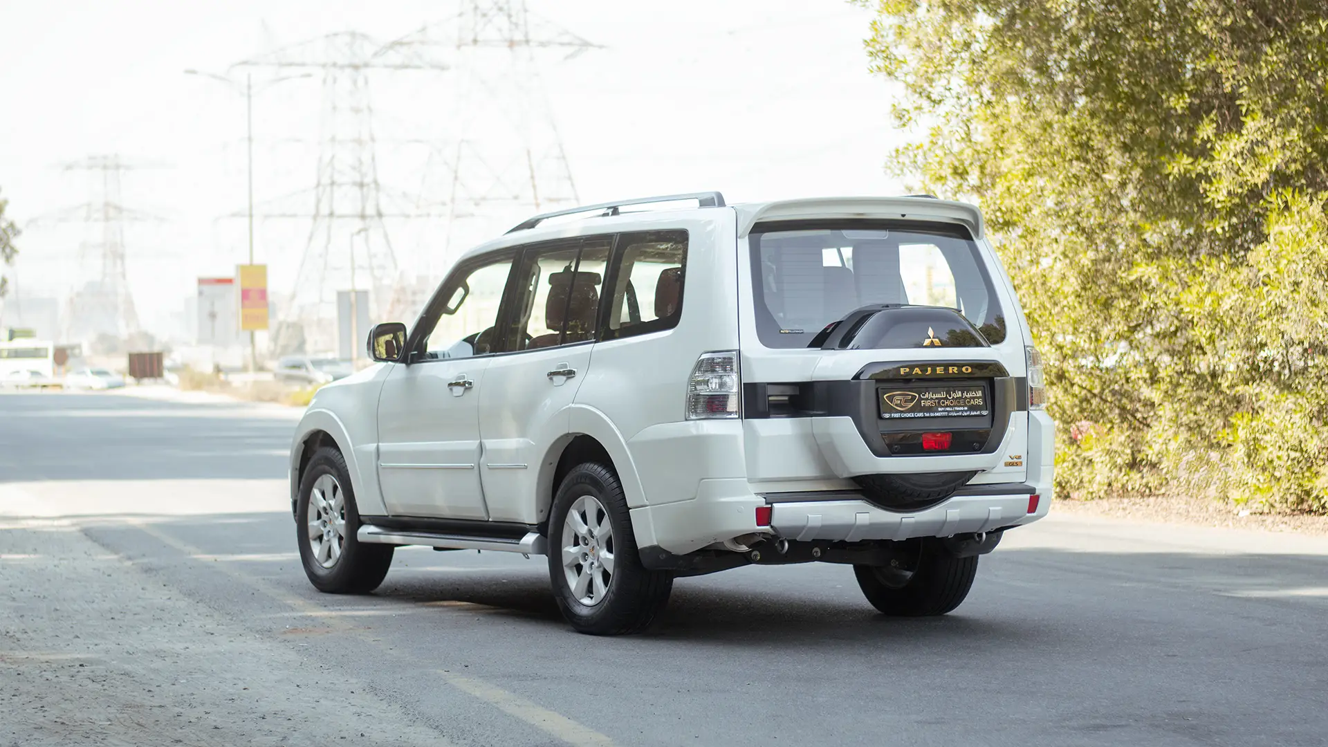 Used 2022 Mitsubishi Pajero GLS in White – Left Back Diagonal (45°) View for Sale at First Choice Cars Dubai Sharjah