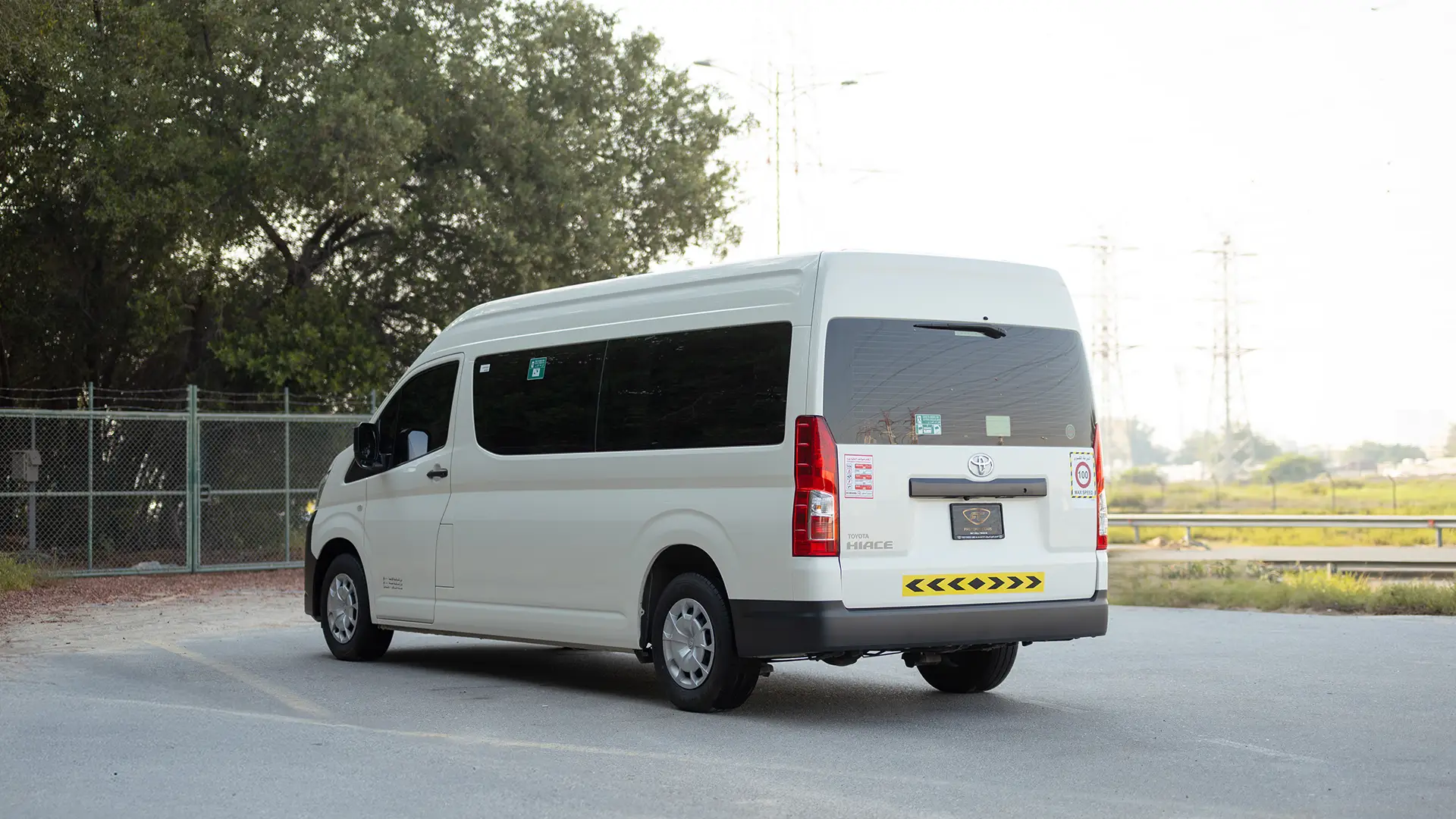 Used 2025 Toyota Hiace GLX High Roof in White – Left Back Diagonal (45°) View for Sale at First Choice Cars Dubai Sharjah