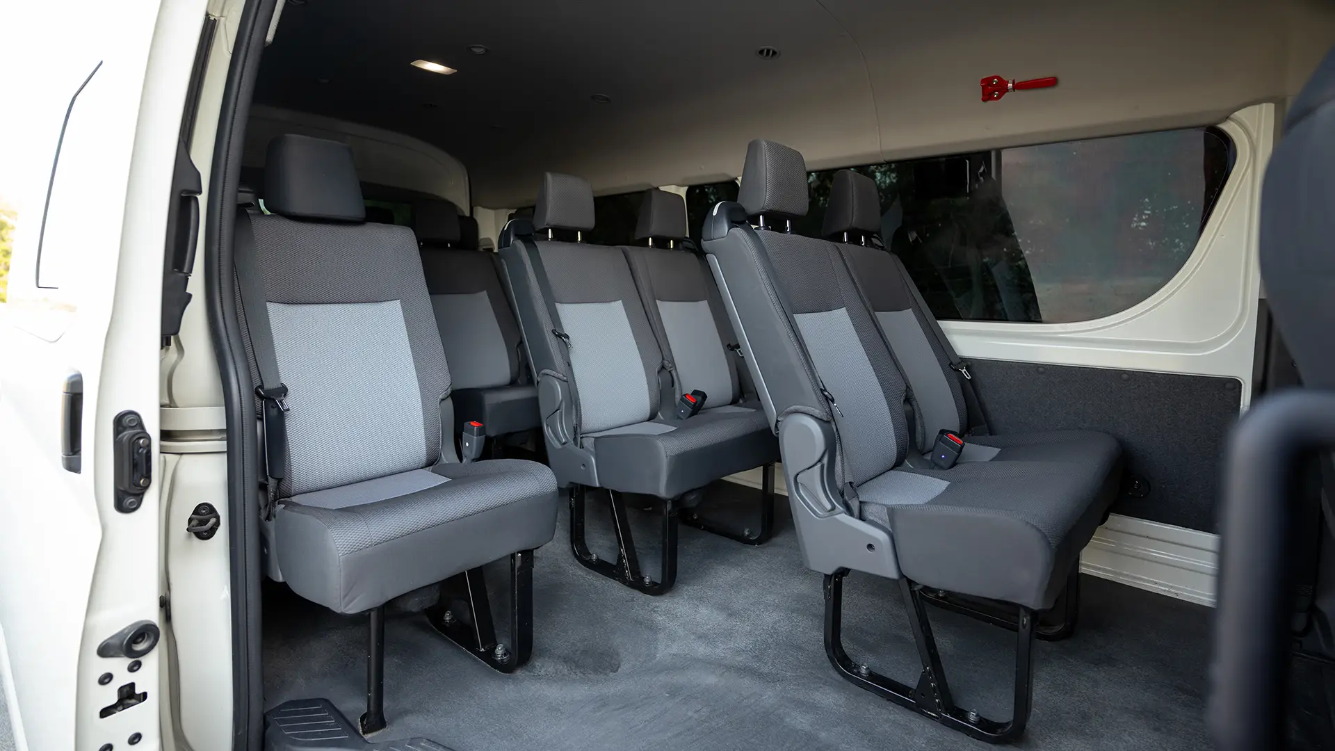Used 2025 Toyota Hiace GLX High Roof in White – Rear Passenger Side Cabin View for Sale at First Choice Cars Dubai Sharjah