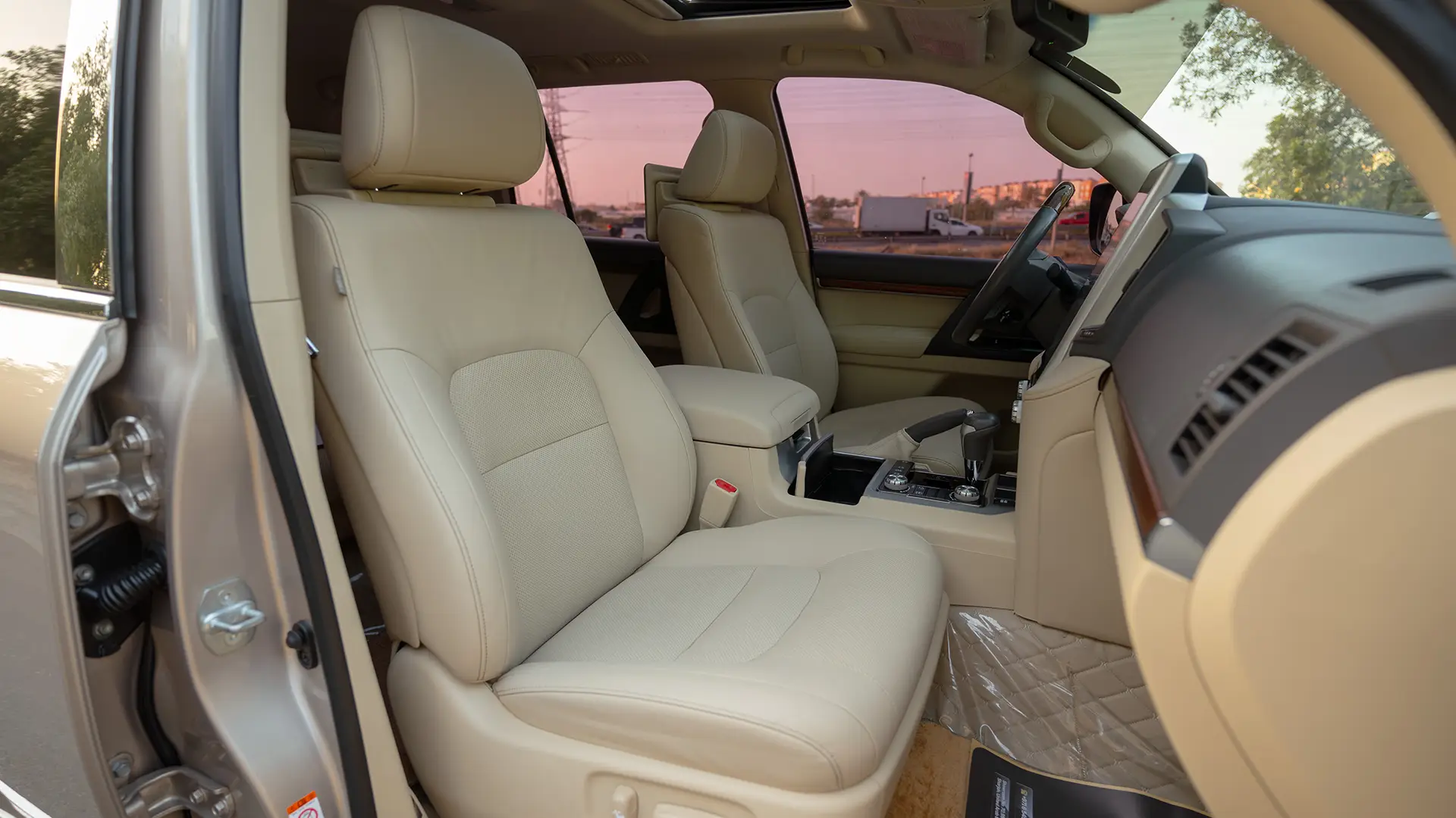 Used 2017 Toyota Land Cruiser GXR in Beige – Front Passenger Side Cabin View for Sale at First Choice Cars Dubai Sharjah