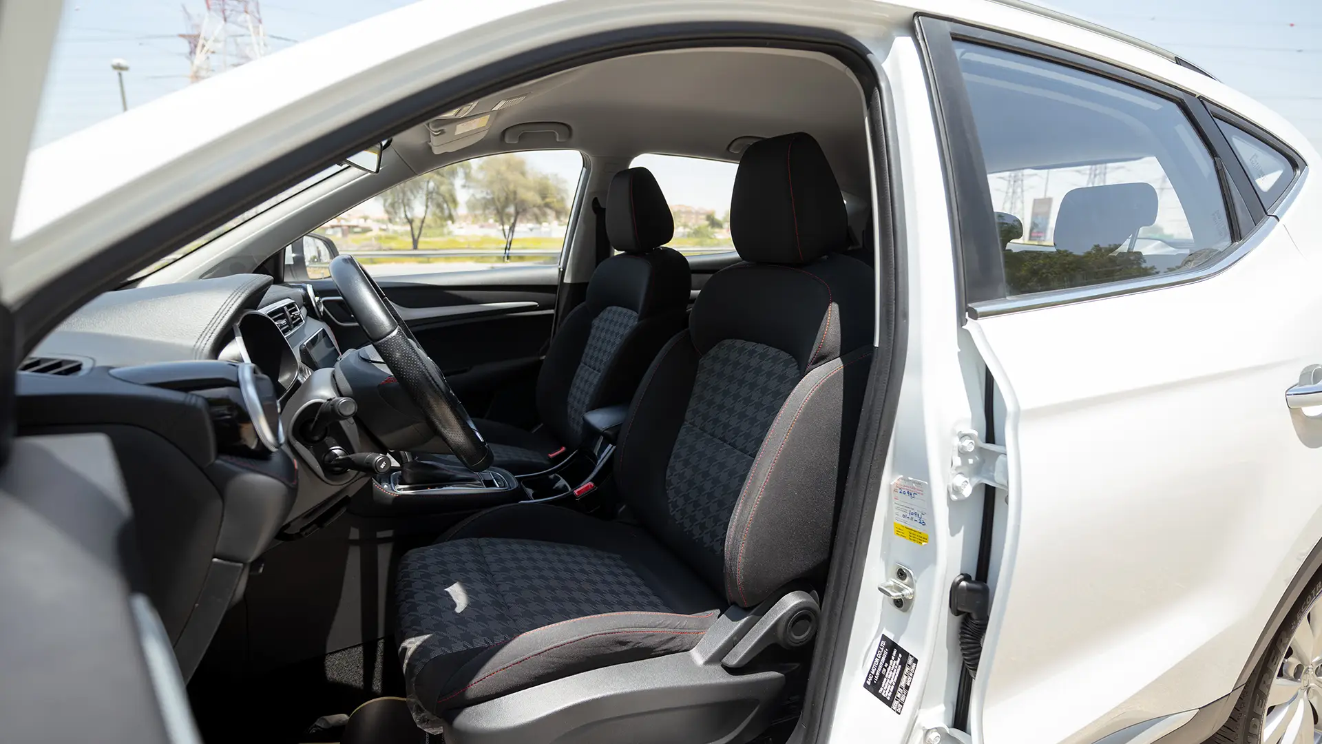 Used 2023 MG ZS Comfort in White – Front Driver Side Cabin View for Sale at First Choice Cars Dubai Sharjah
