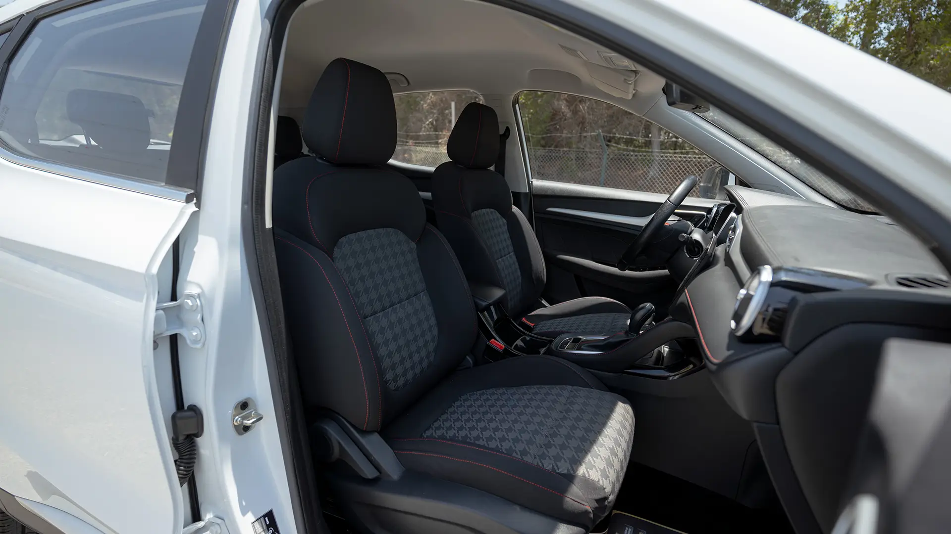 Used 2023 MG ZS Comfort in White – Front Passenger Side Cabin View for Sale at First Choice Cars Dubai Sharjah