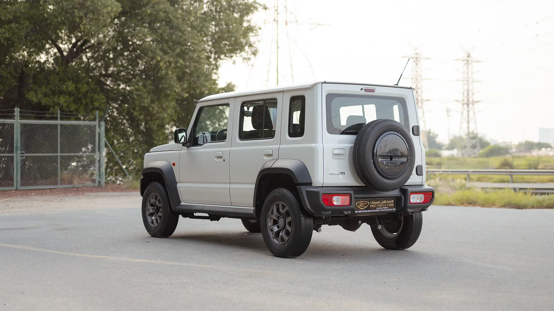 Used 2024 Suzuki Jimny GLX in White – Left Back Diagonal (45°) View for Sale at First Choice Cars Dubai Sharjah