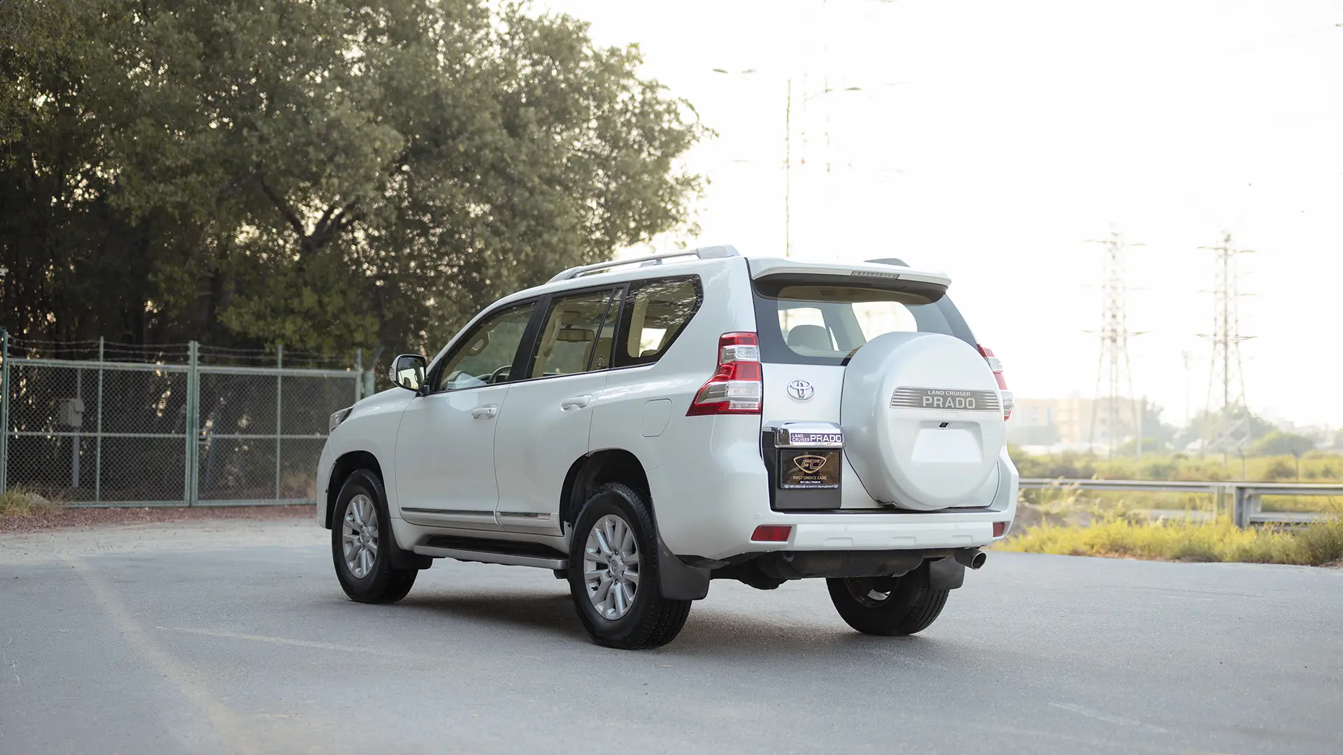 Used 2016 Toyota Prado VXR in White – Left Back Diagonal (45°) View for Sale at First Choice Cars Dubai Sharjah