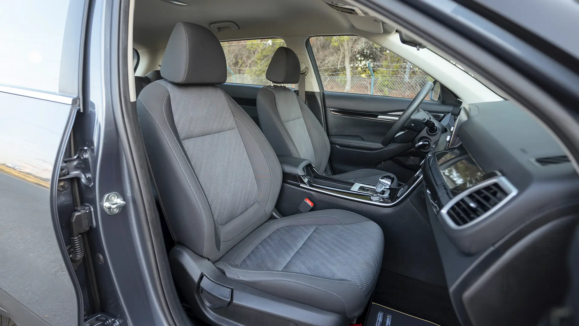 Used 2024 Kia Seltos LX in Grey – Front Passenger Side Cabin View for Sale at First Choice Cars Dubai Sharjah