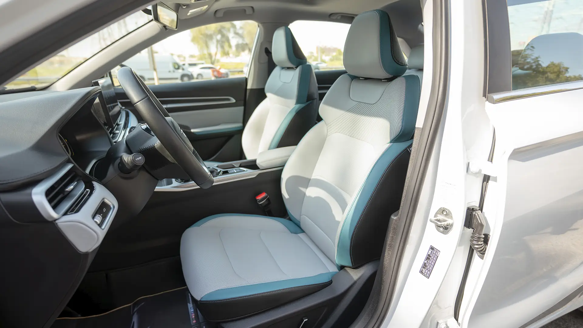 Used 2025 Geely Emgrand GF in White – Front Driver Side Cabin View for Sale at First Choice Cars Dubai Sharjah
