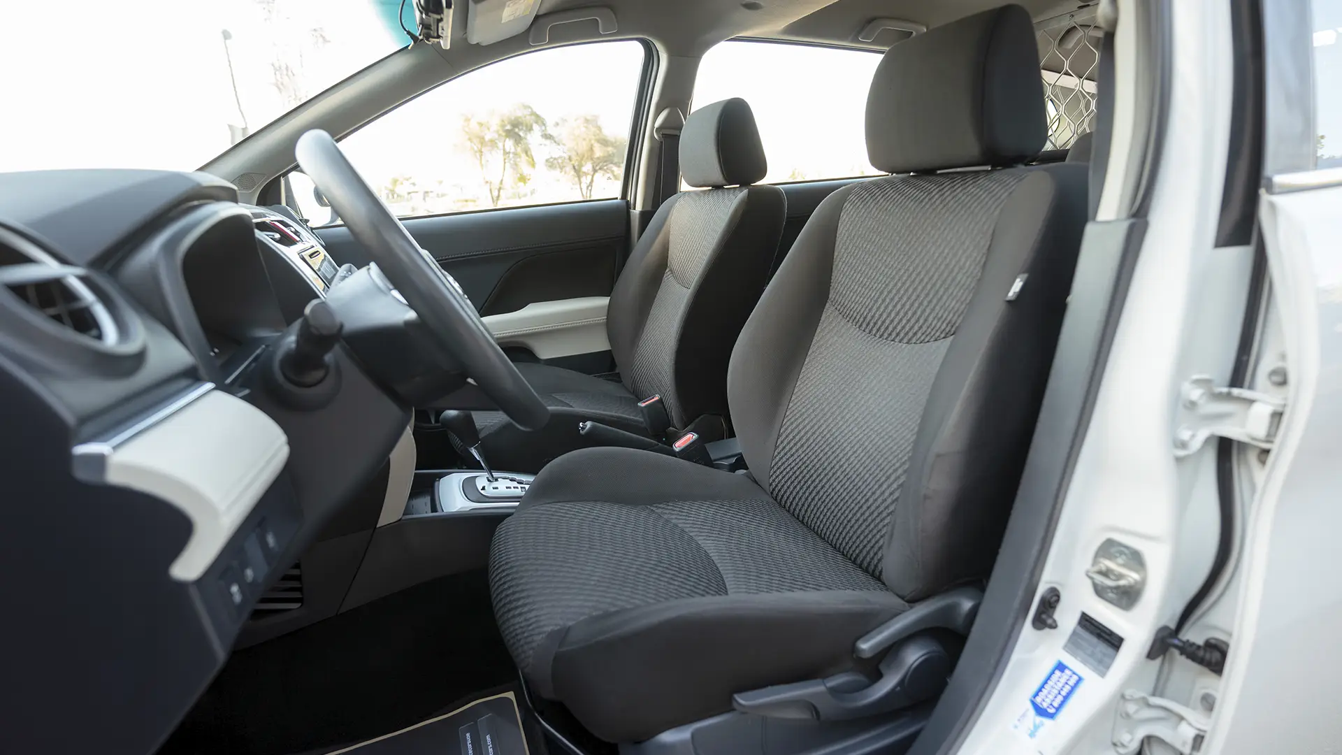 Used 2022 Toyota Rush EX in White – Front Driver Side Cabin View for Sale at First Choice Cars Dubai Sharjah