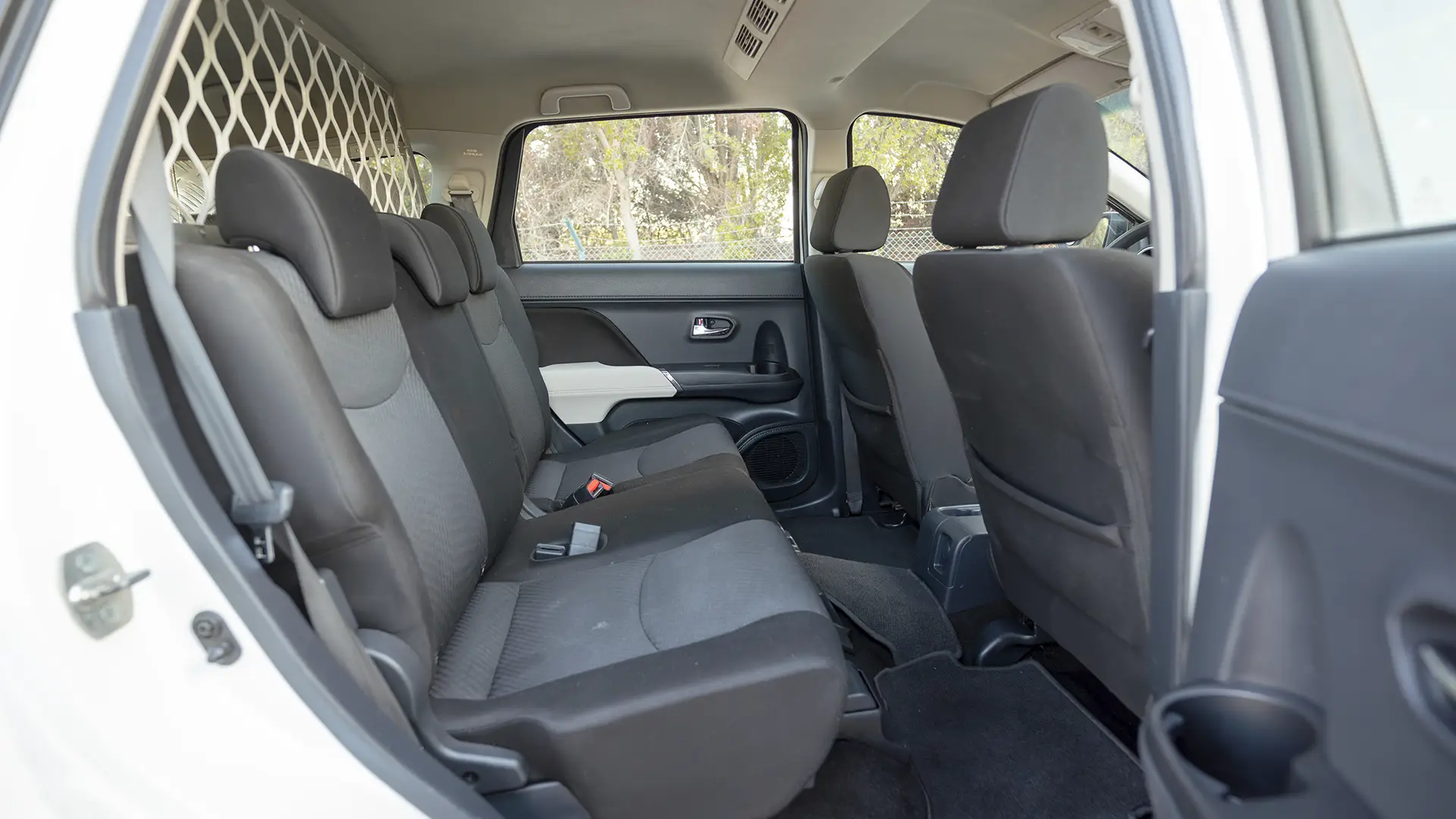 Used 2022 Toyota Rush EX in White – Rear Passenger Side Cabin View for Sale at First Choice Cars Dubai Sharjah