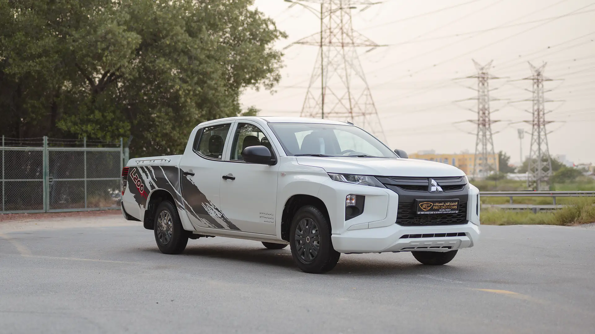 Used 2023 Mitsubishi L200 GLX Double Cabin in White – Right Front Diagonal (45°) View for Sale at First Choice Cars Dubai Sharjah