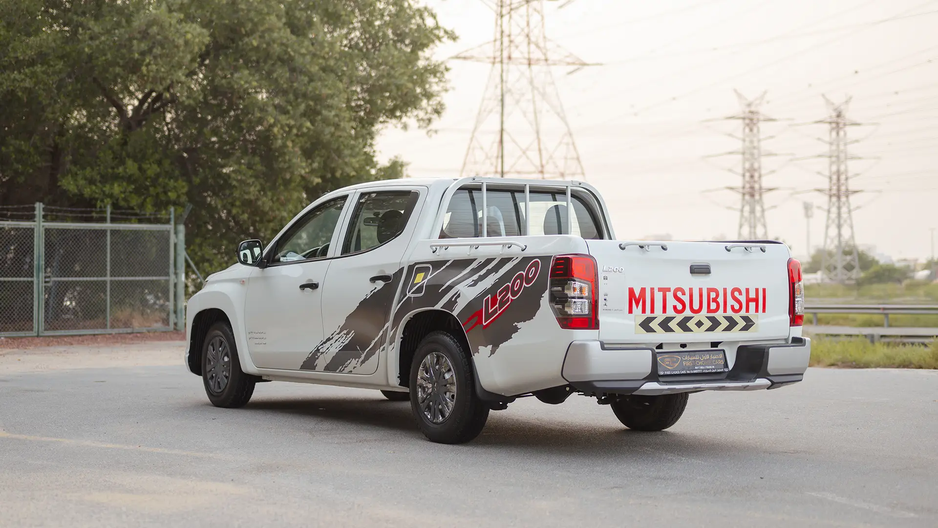 Used 2023 Mitsubishi L200 GLX Double Cabin in White – Left Back Diagonal (45°) View for Sale at First Choice Cars Dubai Sharjah