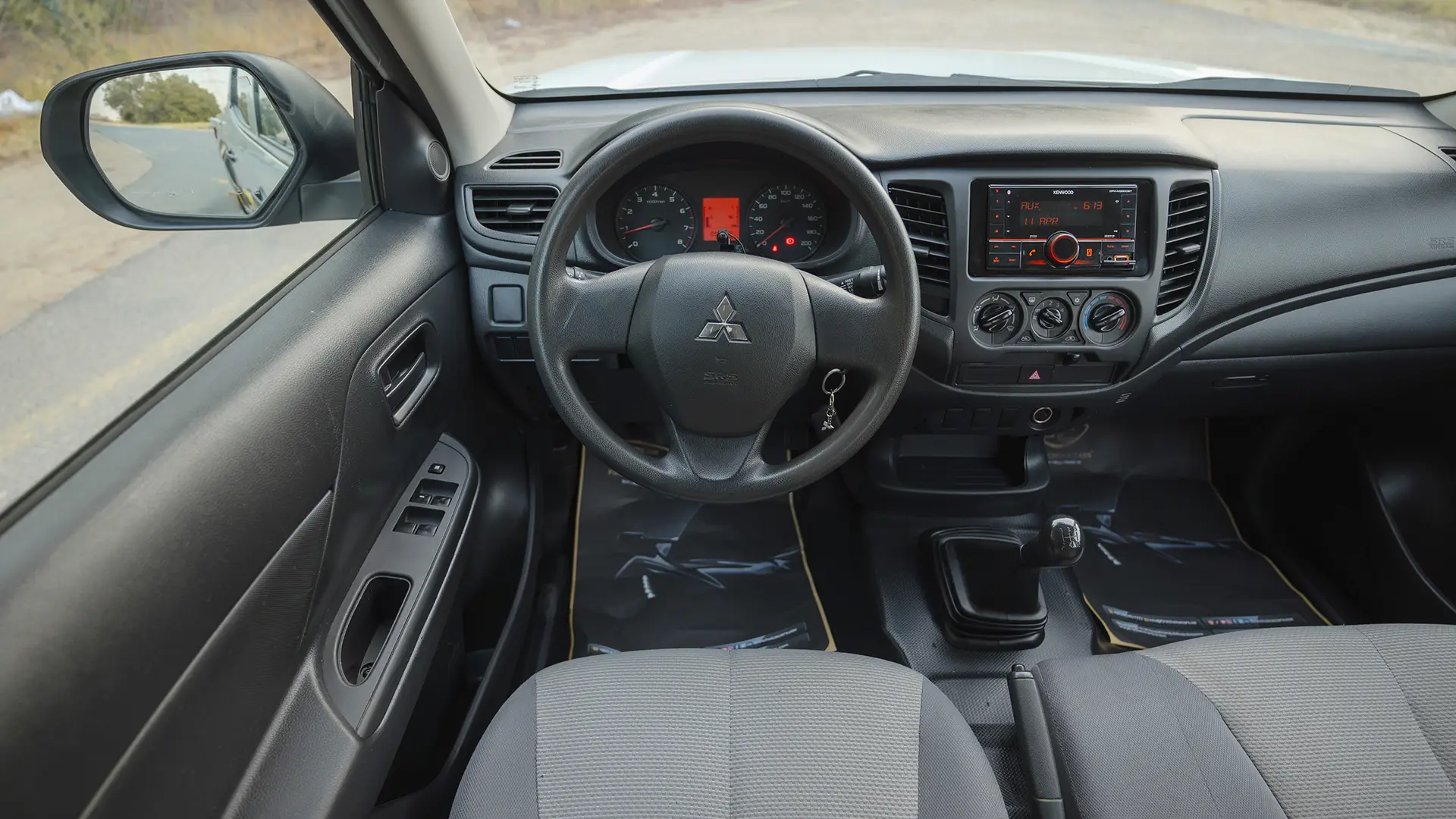 Used 2023 Mitsubishi L200 GLX Double Cabin in White – Steering Wheel & Instrument Cluster for Sale at First Choice Cars Dubai Sharjah
