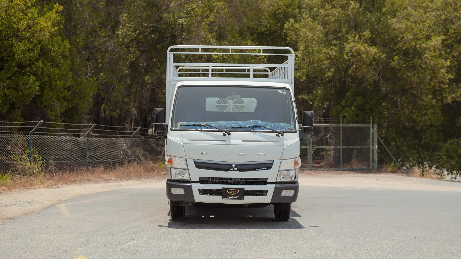 Used 2024 Mitsubishi Canter Cargo Body in White – Front View for Sale at First Choice Cars Dubai Sharjah
