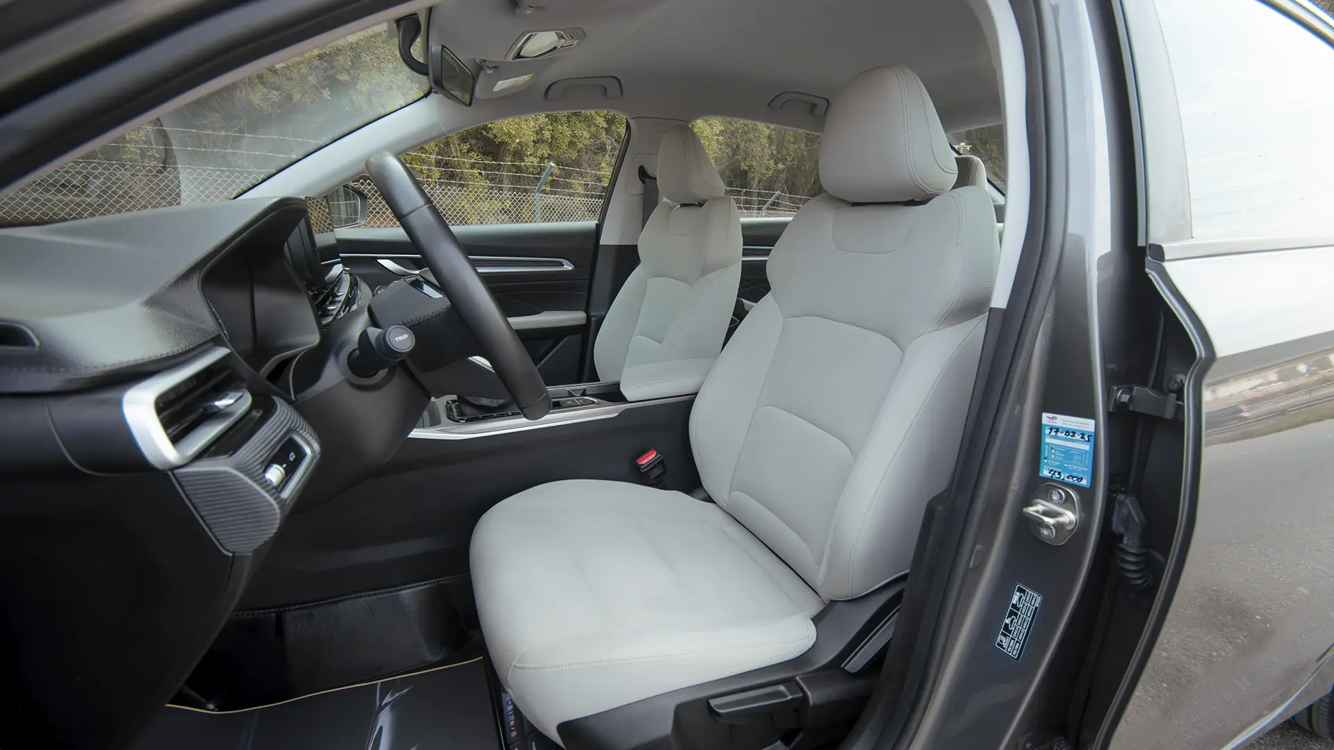 Used 2024 Geely Emgrand GS in Grey – Front Driver Side Cabin View for Sale at First Choice Cars Dubai Sharjah