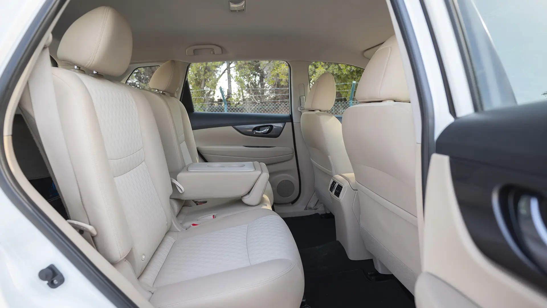 Used 2022 Nissan X-Trail S in White – Rear Passenger Side Cabin View for Sale at First Choice Cars Dubai Sharjah