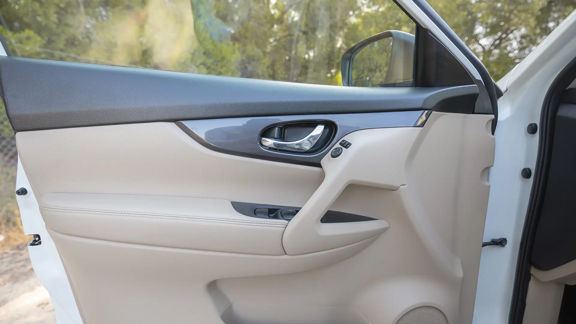 Used 2022 Nissan X-Trail S in White – Driver Door Panel Full View for Sale at First Choice Cars Dubai Sharjah