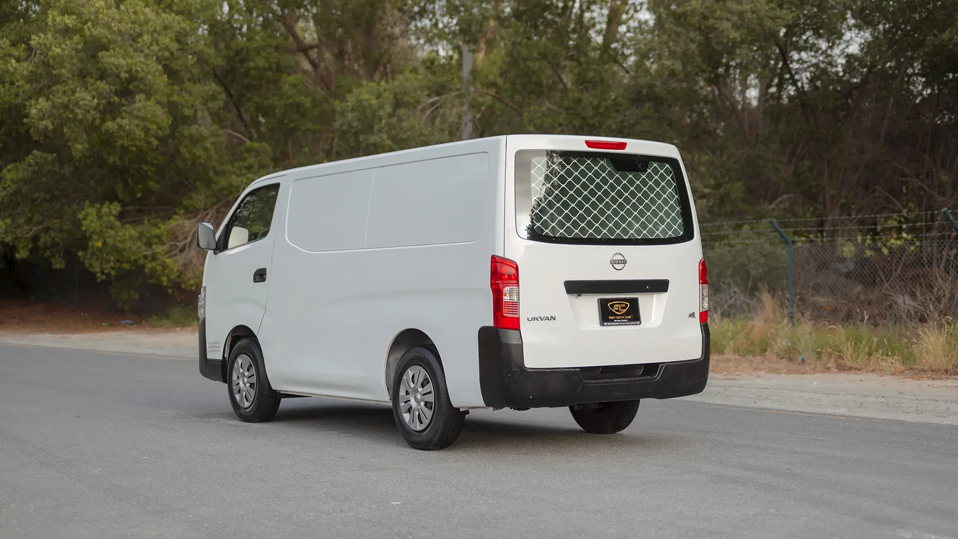 Used 2023 Nissan Urvan Standard Roof in White – Left Back Diagonal (45°) View for Sale at First Choice Cars Dubai Sharjah