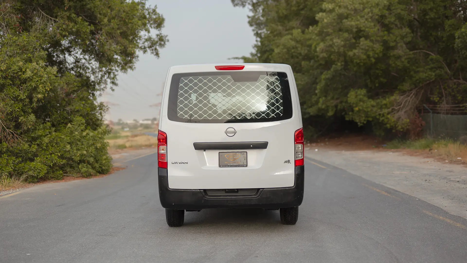 Used 2023 Nissan Urvan Standard Roof in White – Back/Rear View for Sale at First Choice Cars Dubai Sharjah