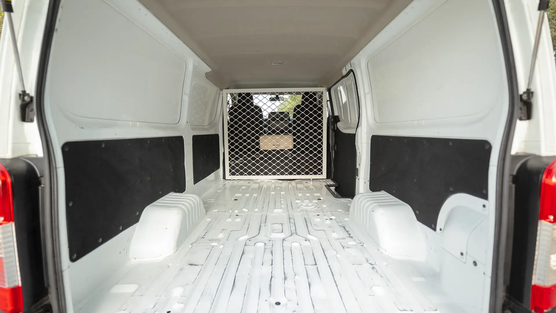 Used 2023 Nissan Urvan Standard Roof in White – Delivery Box Rear Opening View for Sale at First Choice Cars Dubai Sharjah