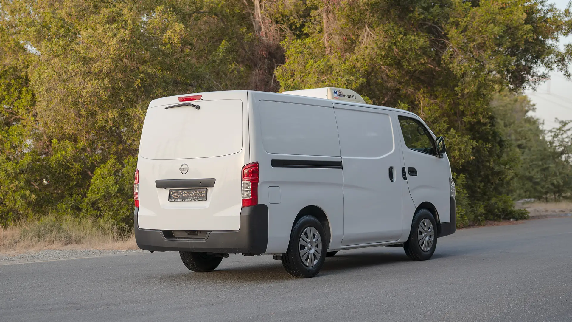 Used 2023 Nissan Urvan Standard Roof in White – Right Back Diagonal (45°) View for Sale at First Choice Cars Dubai Sharjah