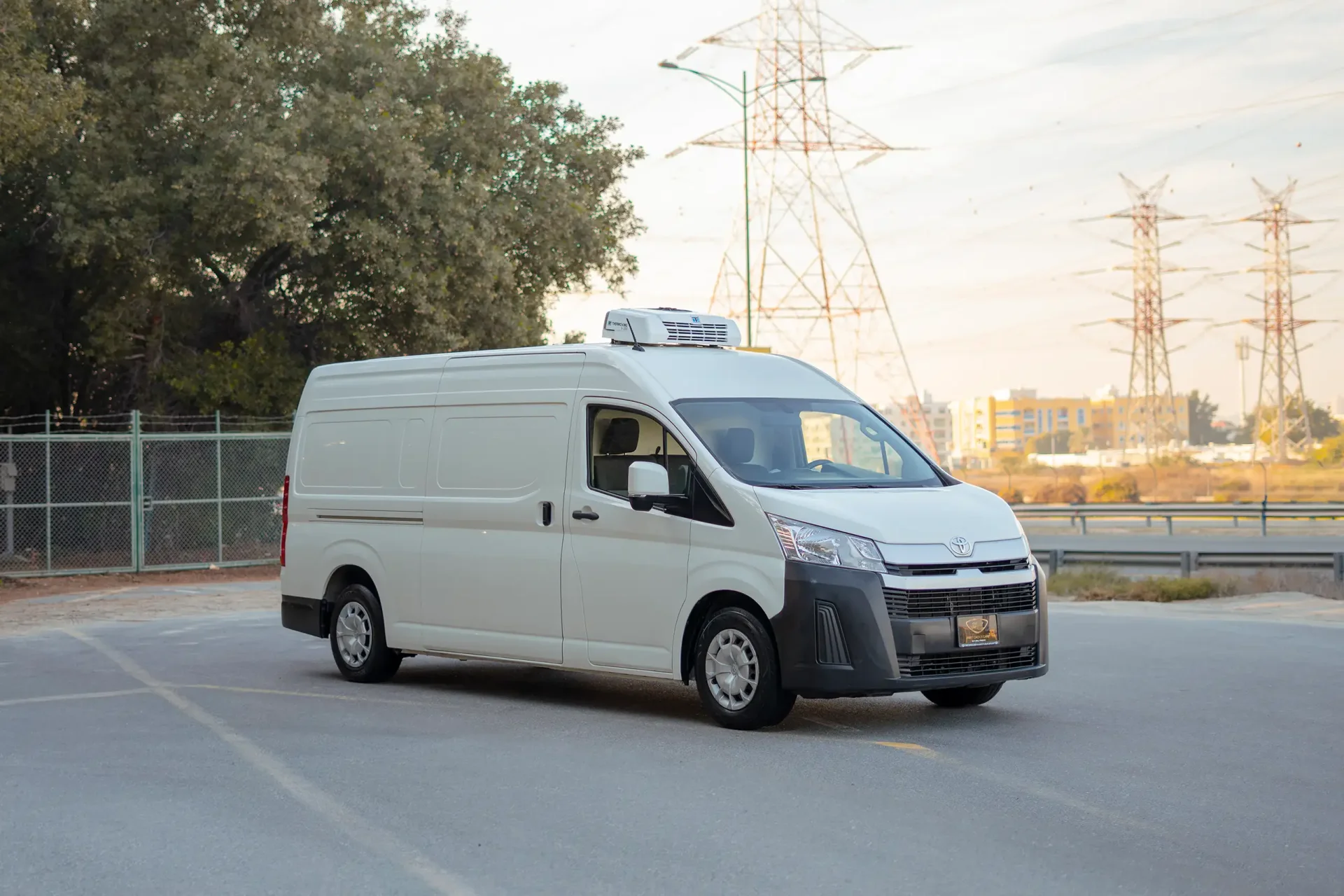 Used 2020 Toyota Hiace GLX High Roof in White – Right Front Diagonal (45°) View for Sale at First Choice Cars Dubai Sharjah