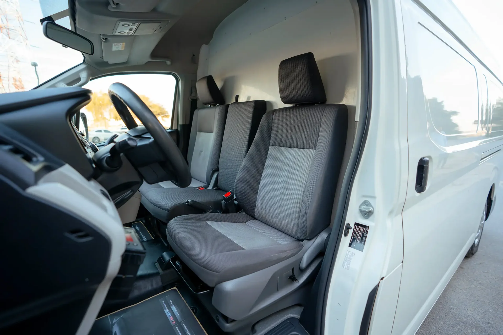 Used 2020 Toyota Hiace GLX High Roof in White – Front Driver Side Cabin View for Sale at First Choice Cars Dubai Sharjah