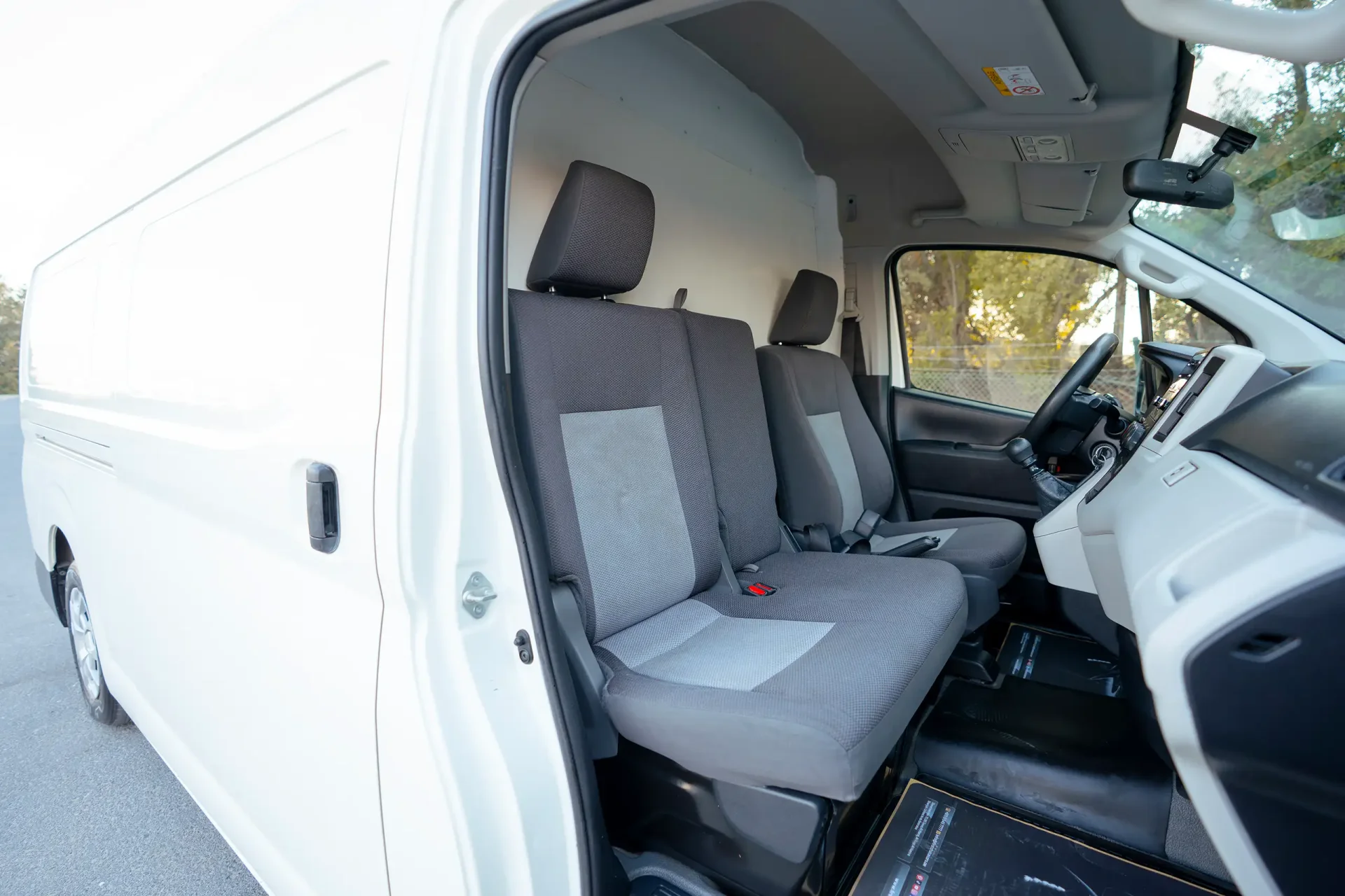 Used 2020 Toyota Hiace GLX High Roof in White – Front Passenger Side Cabin View for Sale at First Choice Cars Dubai Sharjah