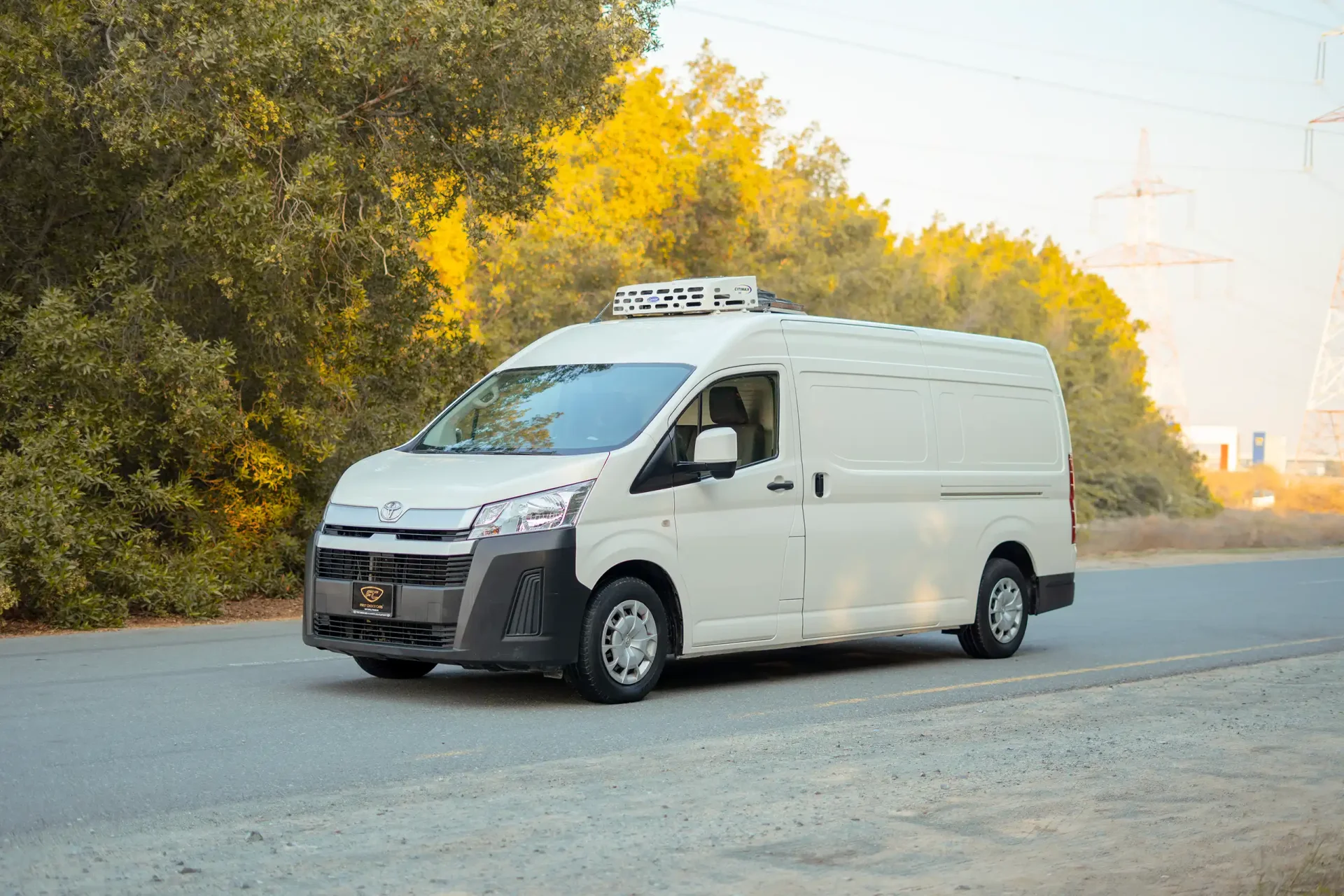 Used 2020 Toyota Hiace GLX High Roof in White – Left Front Diagonal (45°) View for Sale at First Choice Cars Dubai Sharjah