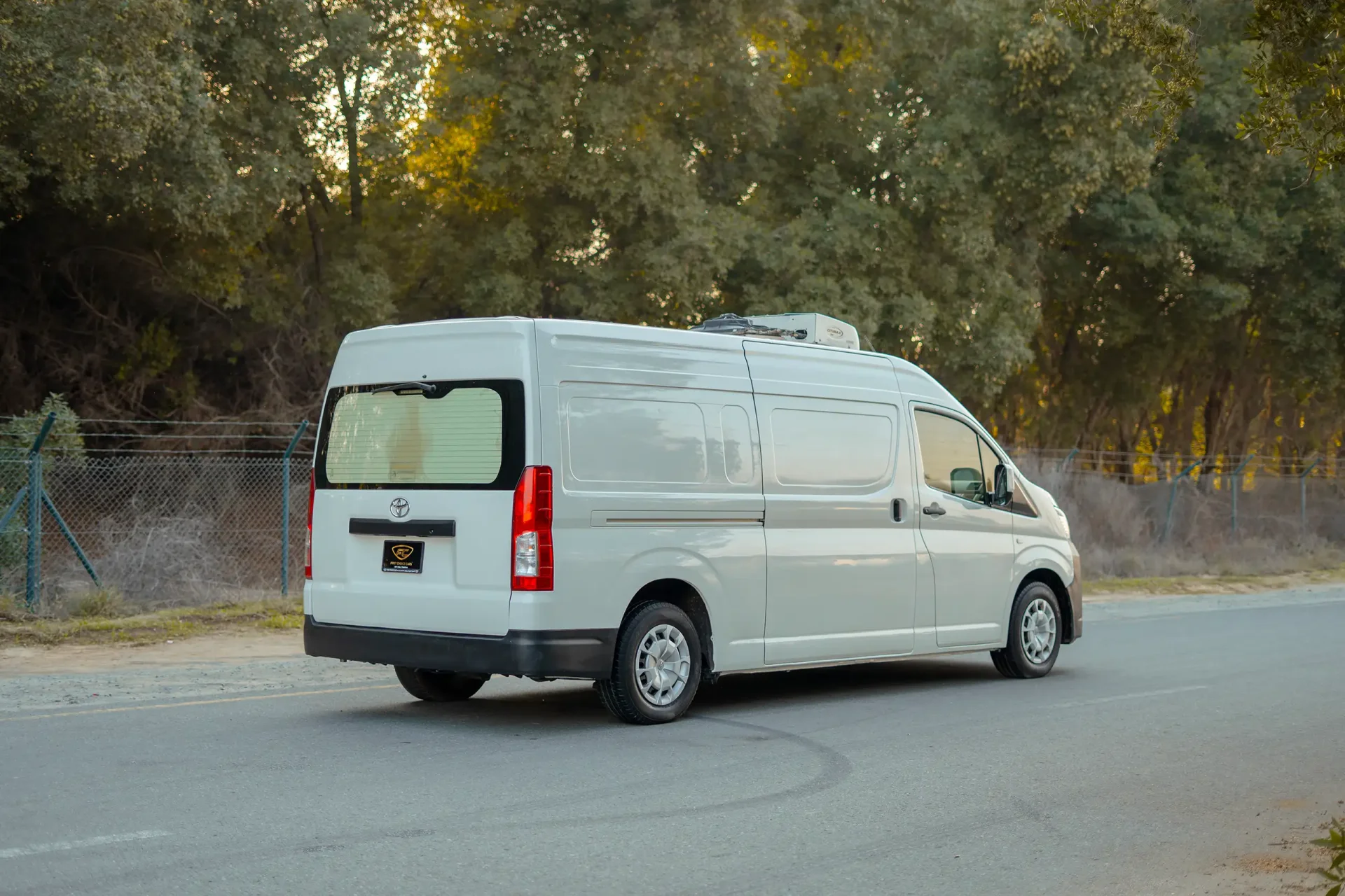 Used 2020 Toyota Hiace GLX High Roof in White – Right Back Diagonal (45°) View for Sale at First Choice Cars Dubai Sharjah