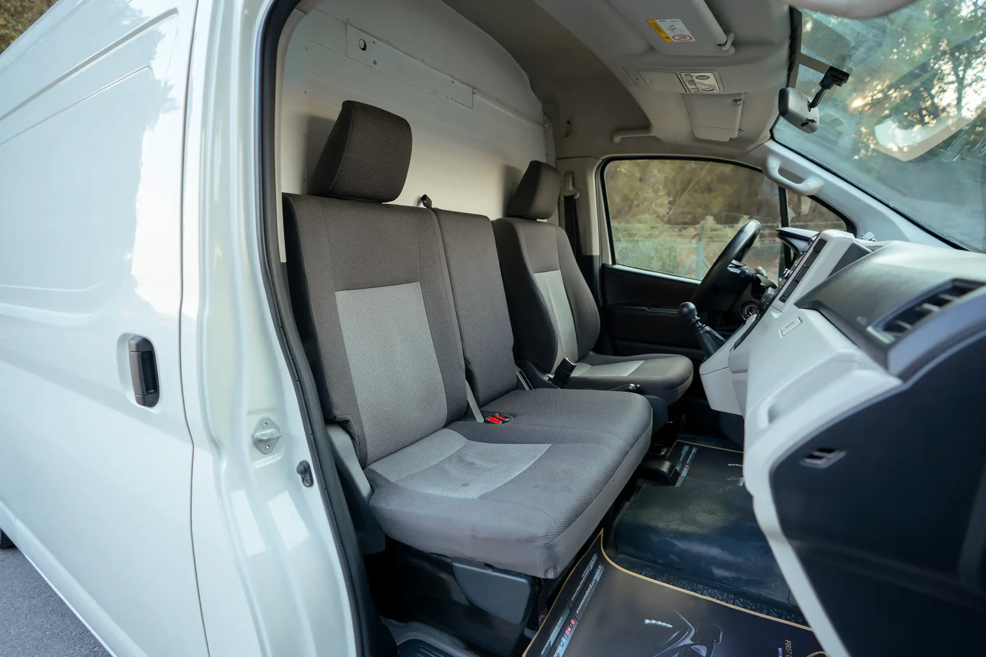 Used 2020 Toyota Hiace GLX High Roof in White – Front Passenger Side Cabin View for Sale at First Choice Cars Dubai Sharjah