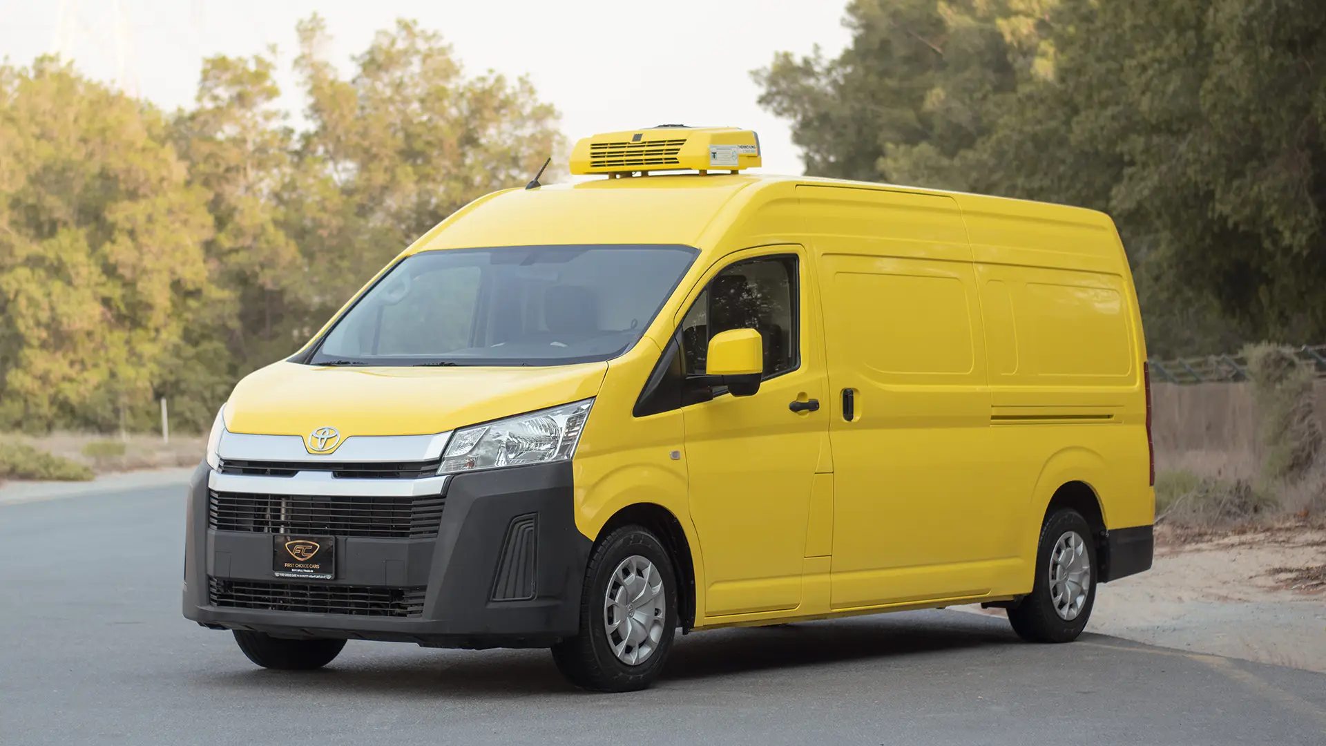 Used 2020 Toyota Hiace GLX High Roof in Yellow – Left Front Diagonal (45°) View for Sale at First Choice Cars Dubai Sharjah