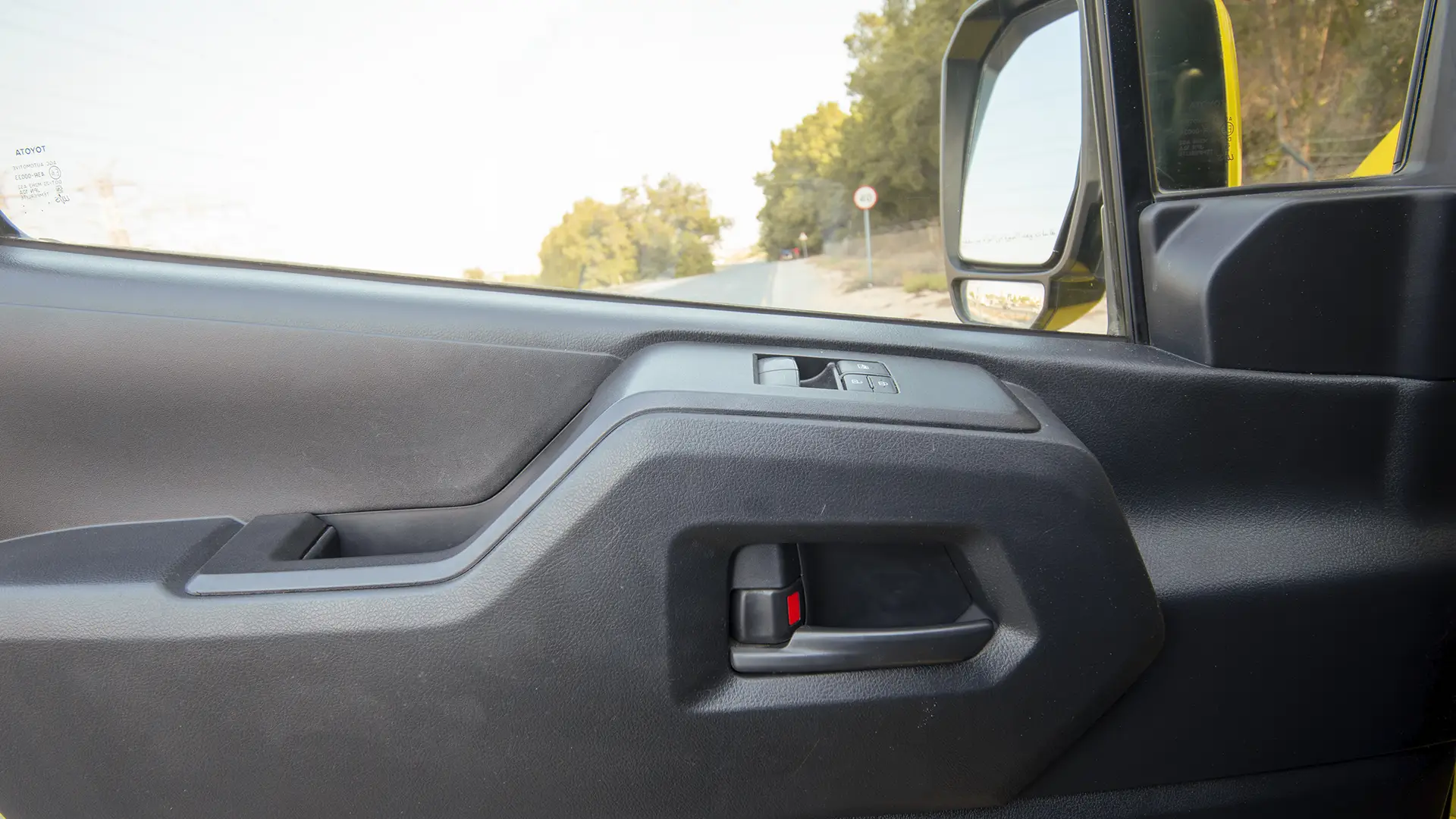 Used 2020 Toyota Hiace GLX High Roof in Yellow – Driver Door Panel Full View for Sale at First Choice Cars Dubai Sharjah