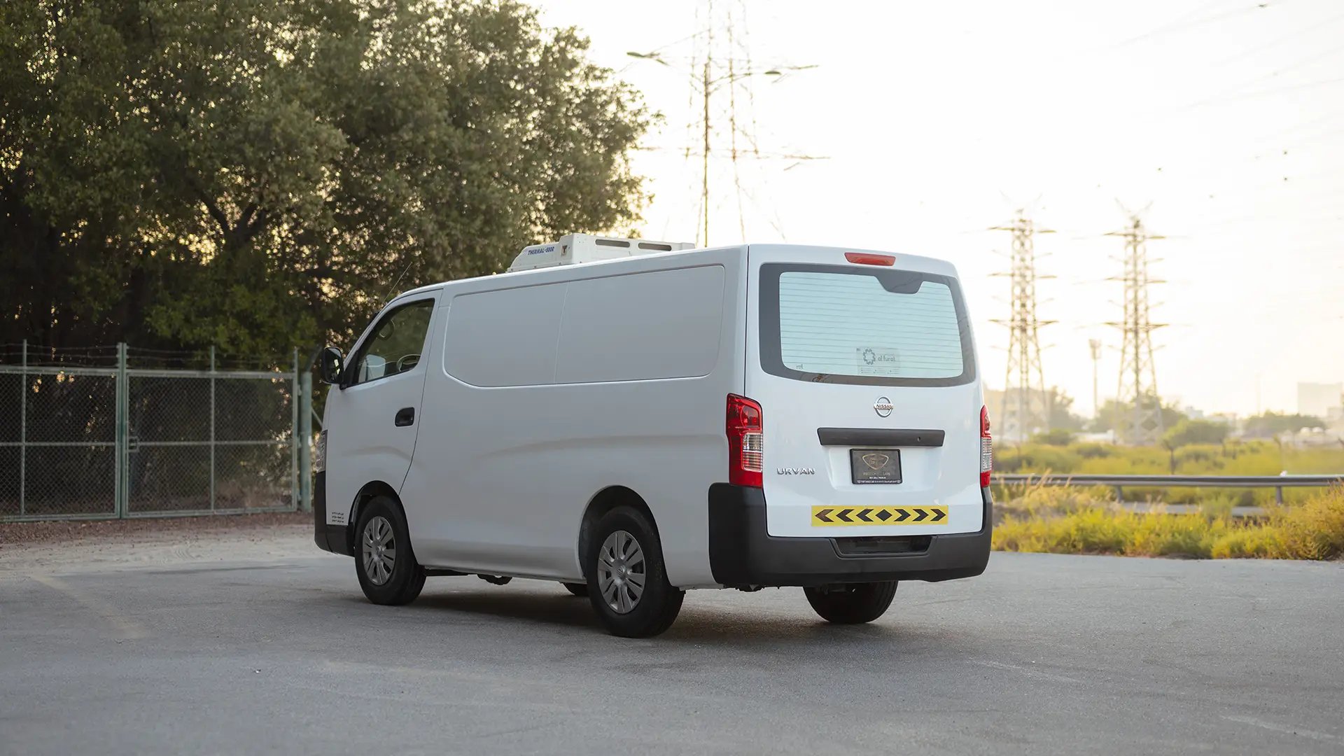 Used 2022 Nissan Urvan Standard Roof in White – Left Back Diagonal (45°) View for Sale at First Choice Cars Dubai Sharjah