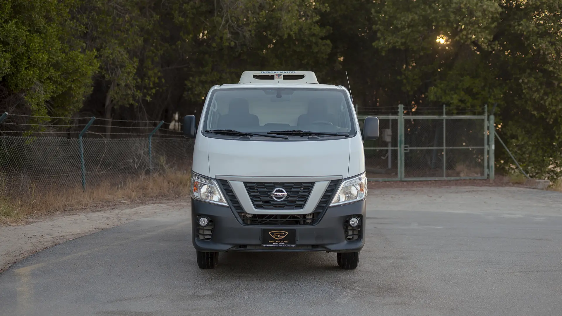 Used 2022 Nissan Urvan Standard Roof in White – Front View for Sale at First Choice Cars Dubai Sharjah