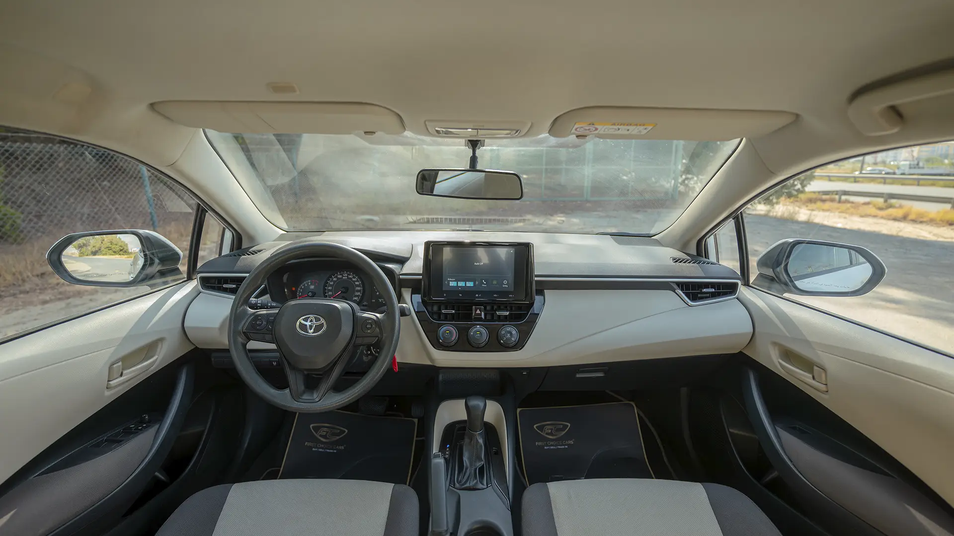 Used 2024 Toyota Corolla XLI in White – Front Cabin / Dashboard Full View for Sale at First Choice Cars Dubai Sharjah