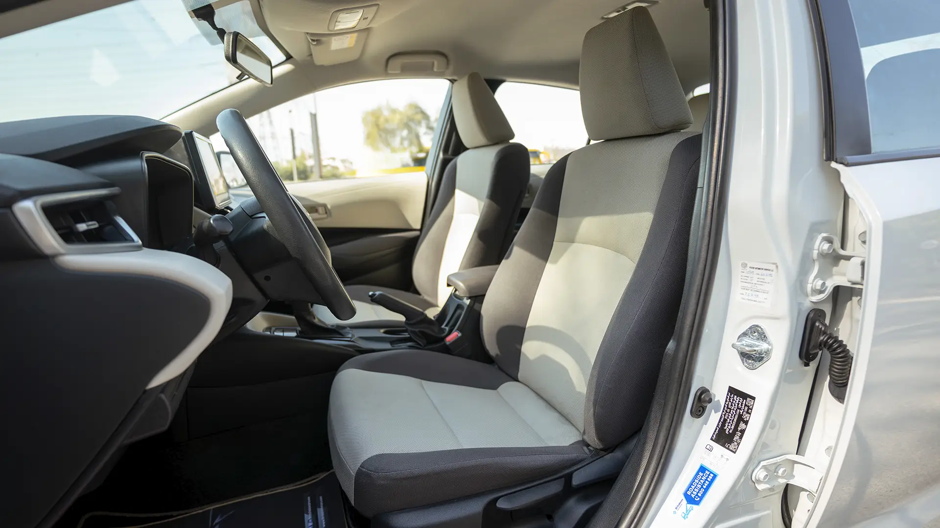 Used 2024 Toyota Corolla XLI in White – Front Driver Side Cabin View for Sale at First Choice Cars Dubai Sharjah