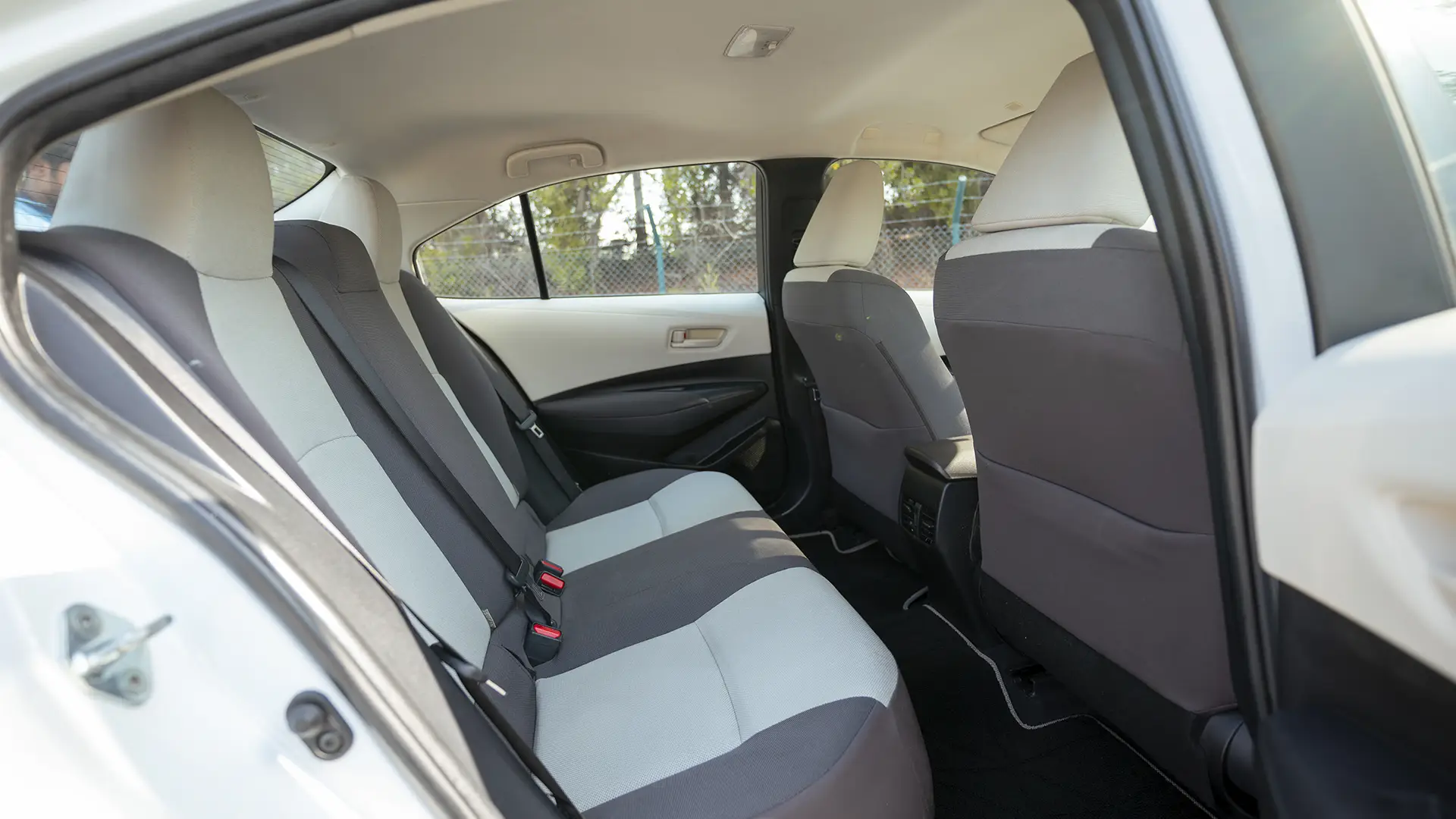 Used 2024 Toyota Corolla XLI in White – Rear Passenger Side Cabin View for Sale at First Choice Cars Dubai Sharjah