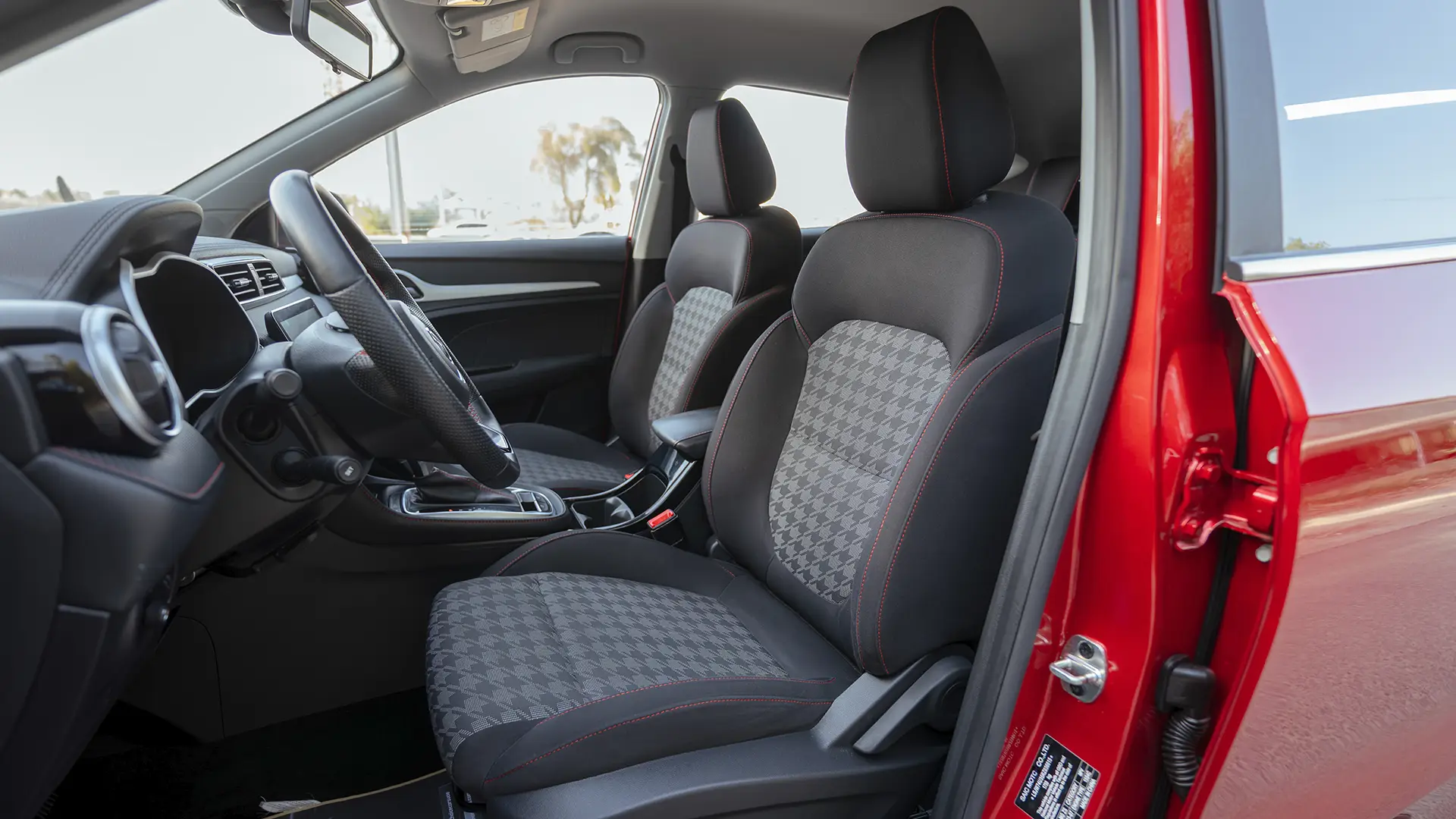 Used 2024 MG ZS Comfort in Red – Front Driver Side Cabin View for Sale at First Choice Cars Dubai Sharjah