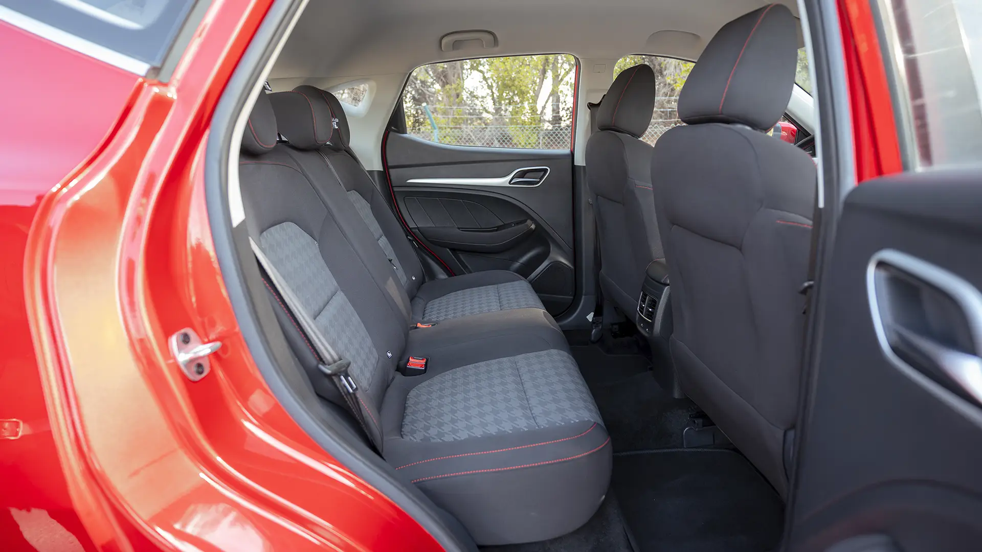 Used 2024 MG ZS Comfort in Red – Rear Passenger Side Cabin View for Sale at First Choice Cars Dubai Sharjah