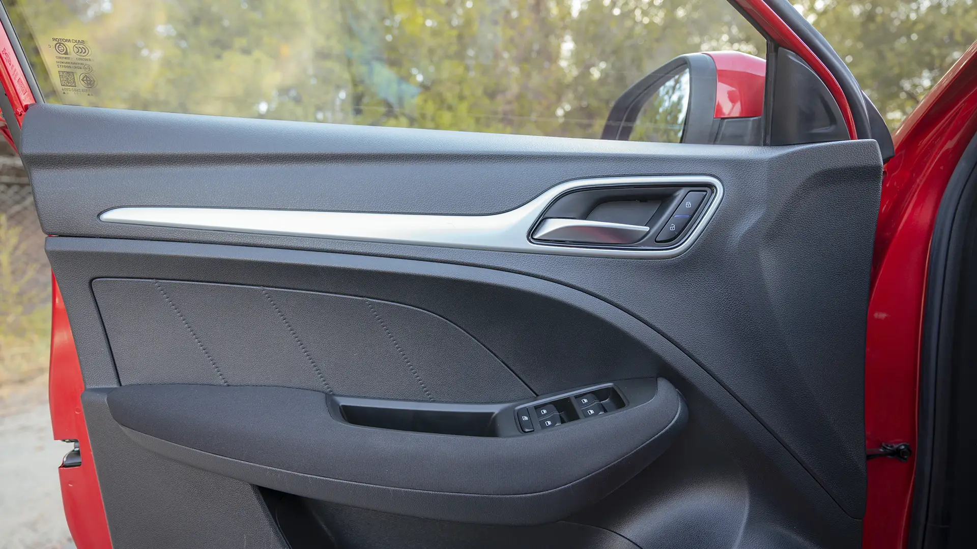 Used 2024 MG ZS Comfort in Red – Driver Door Panel Full View for Sale at First Choice Cars Dubai Sharjah