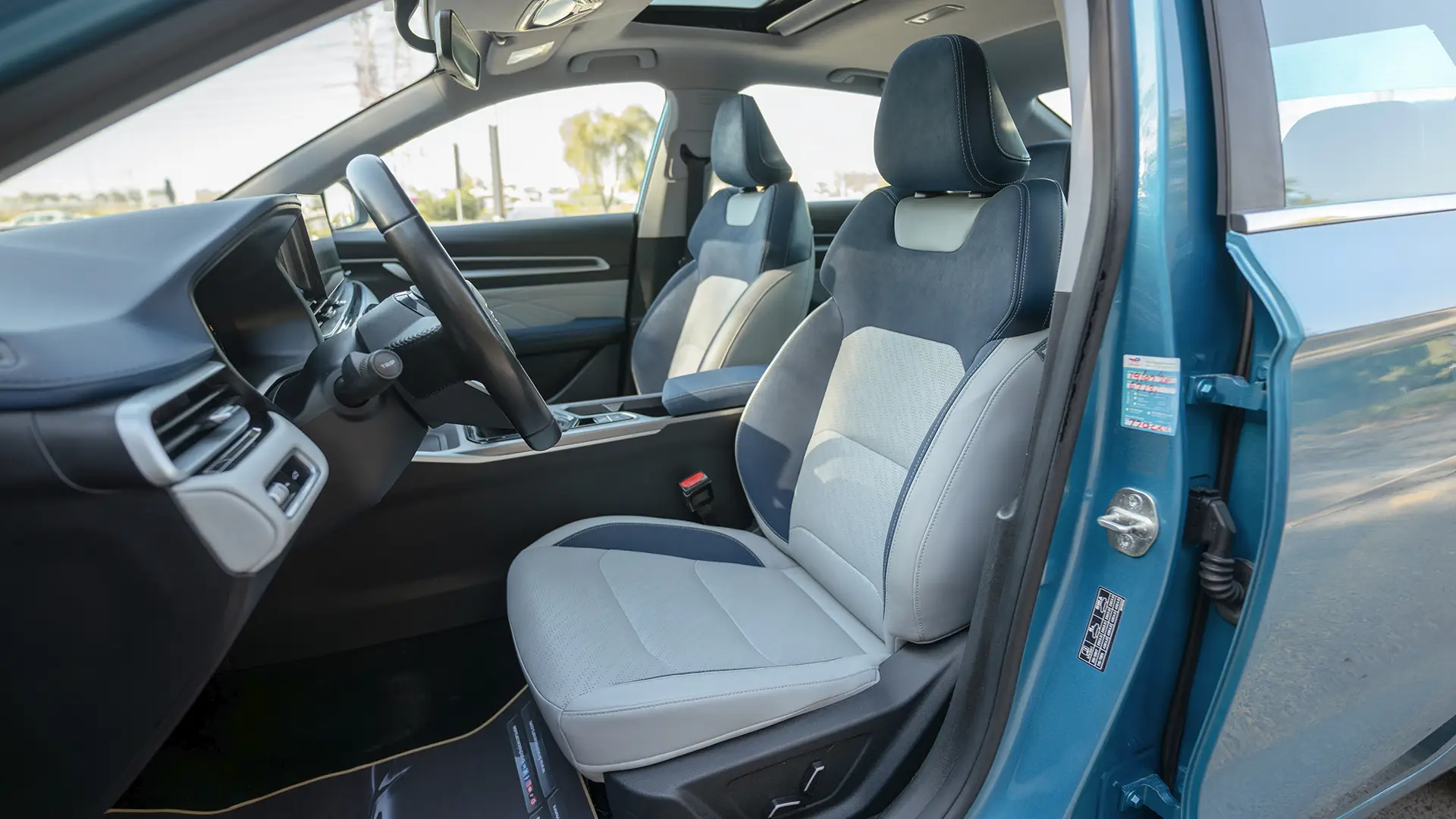 Used 2024 Geely Emgrand GF in Blue – Front Driver Side Cabin View for Sale at First Choice Cars Dubai Sharjah