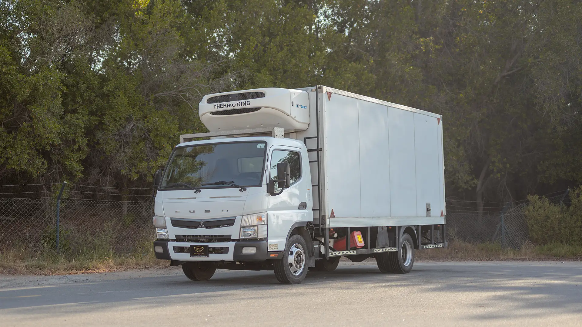 Used 2022 Mitsubishi Canter Chiller Box in White – Left Front Diagonal (45°) View for Sale at First Choice Cars Dubai Sharjah