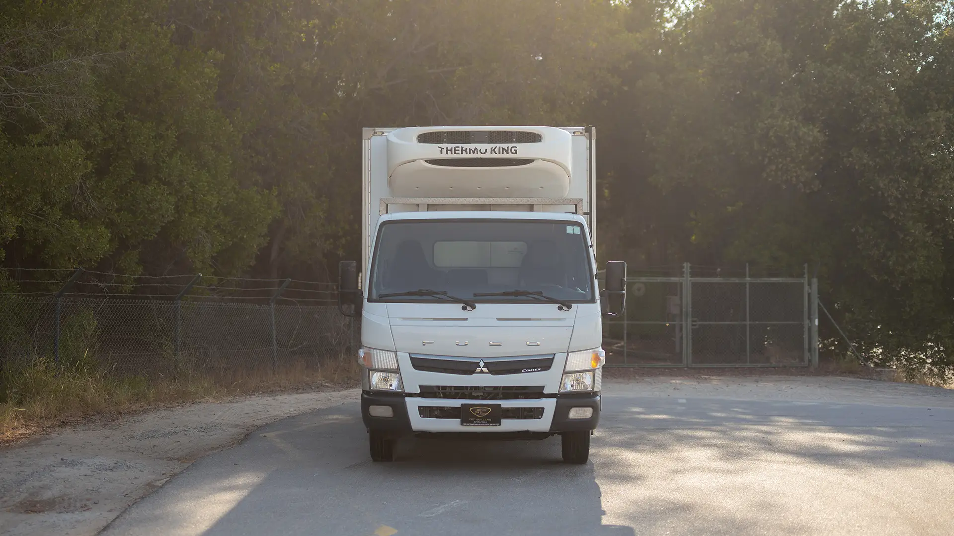 Used 2022 Mitsubishi Canter Chiller Box in White – Front View for Sale at First Choice Cars Dubai Sharjah