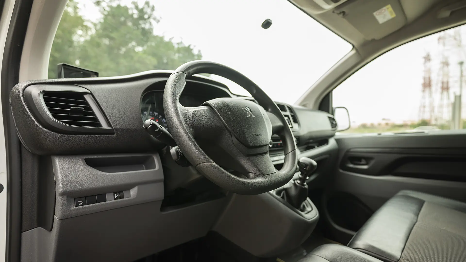 Used 2021 Peugeot Expert L3 in Yellow – Driver Side Dashboard & Steering View for Sale at First Choice Cars Dubai Sharjah