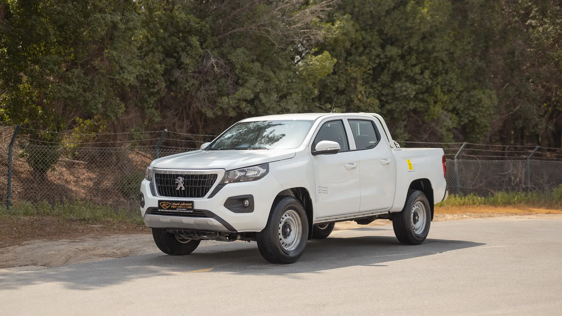 Used 2023 Peugeot Landtrek Double Cabin in White – Left Front Diagonal (45°) View for Sale at First Choice Cars Dubai Sharjah
