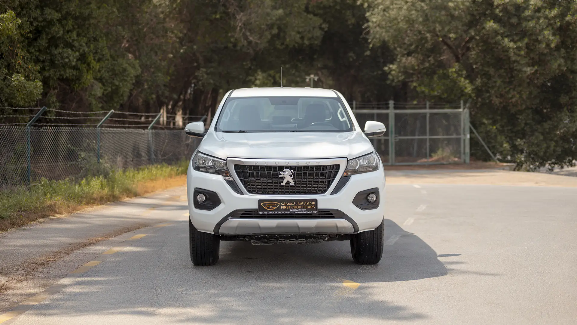 Used 2023 Peugeot Landtrek Double Cabin in White – Front View for Sale at First Choice Cars Dubai Sharjah