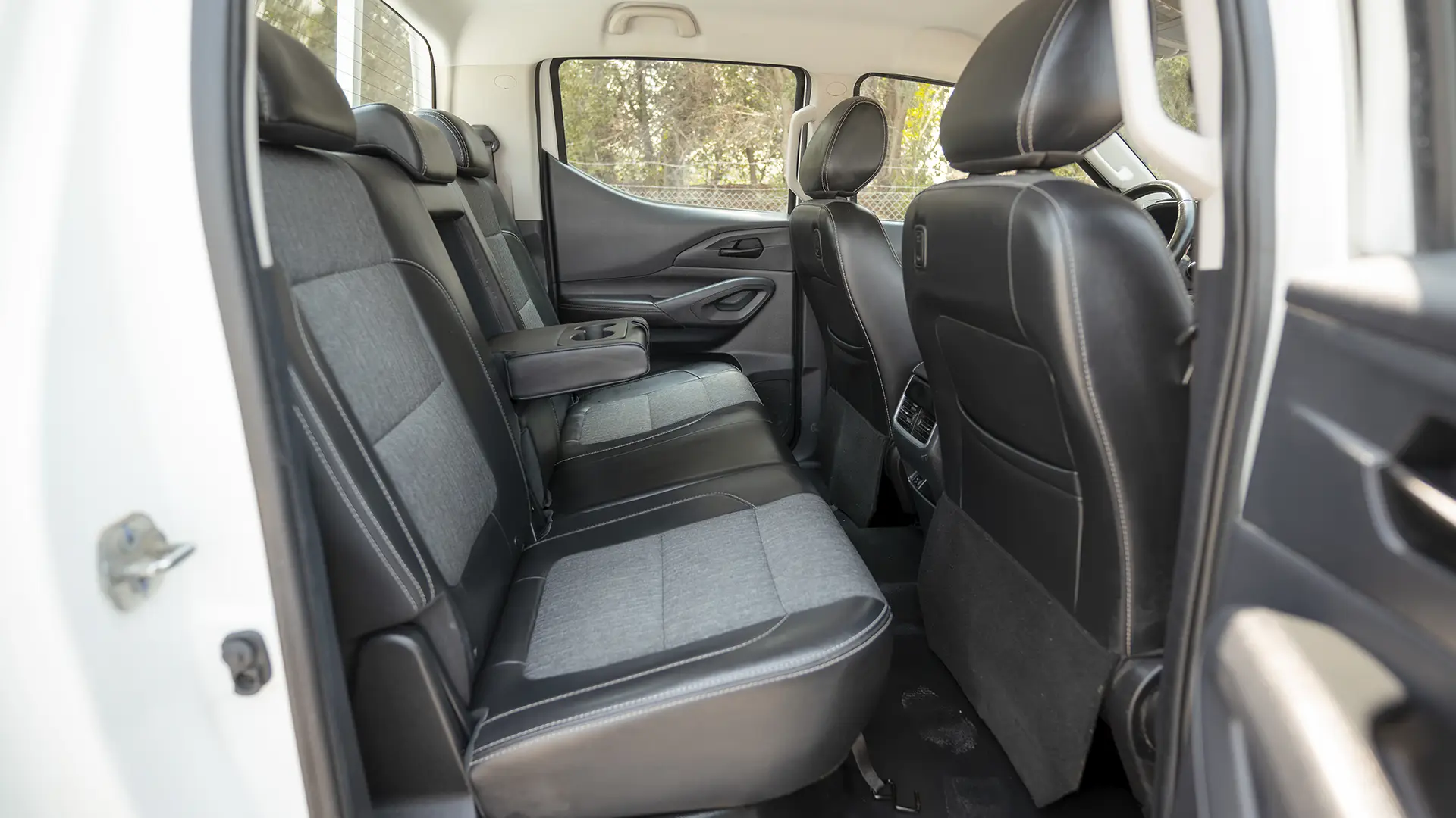 Used 2023 Peugeot Landtrek Double Cabin in White – Rear Passenger Side Cabin View for Sale at First Choice Cars Dubai Sharjah