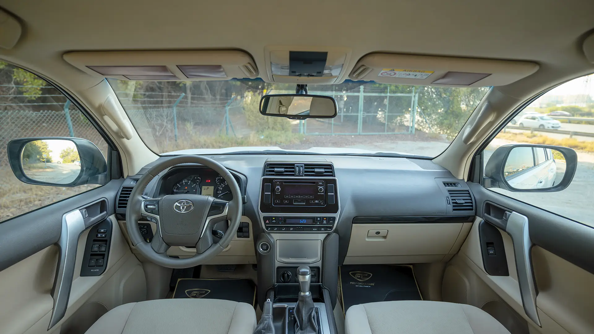Used 2019 Toyota Prado EXR in White – Front Cabin / Dashboard Full View for Sale at First Choice Cars Dubai Sharjah