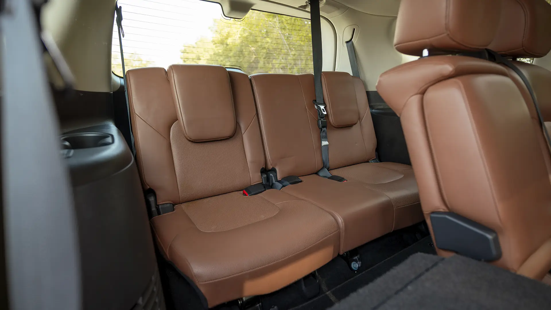 Used 2024 Infiniti QX80 Luxury in Blue – Third Row Right Seat View for Sale at First Choice Cars Dubai Sharjah